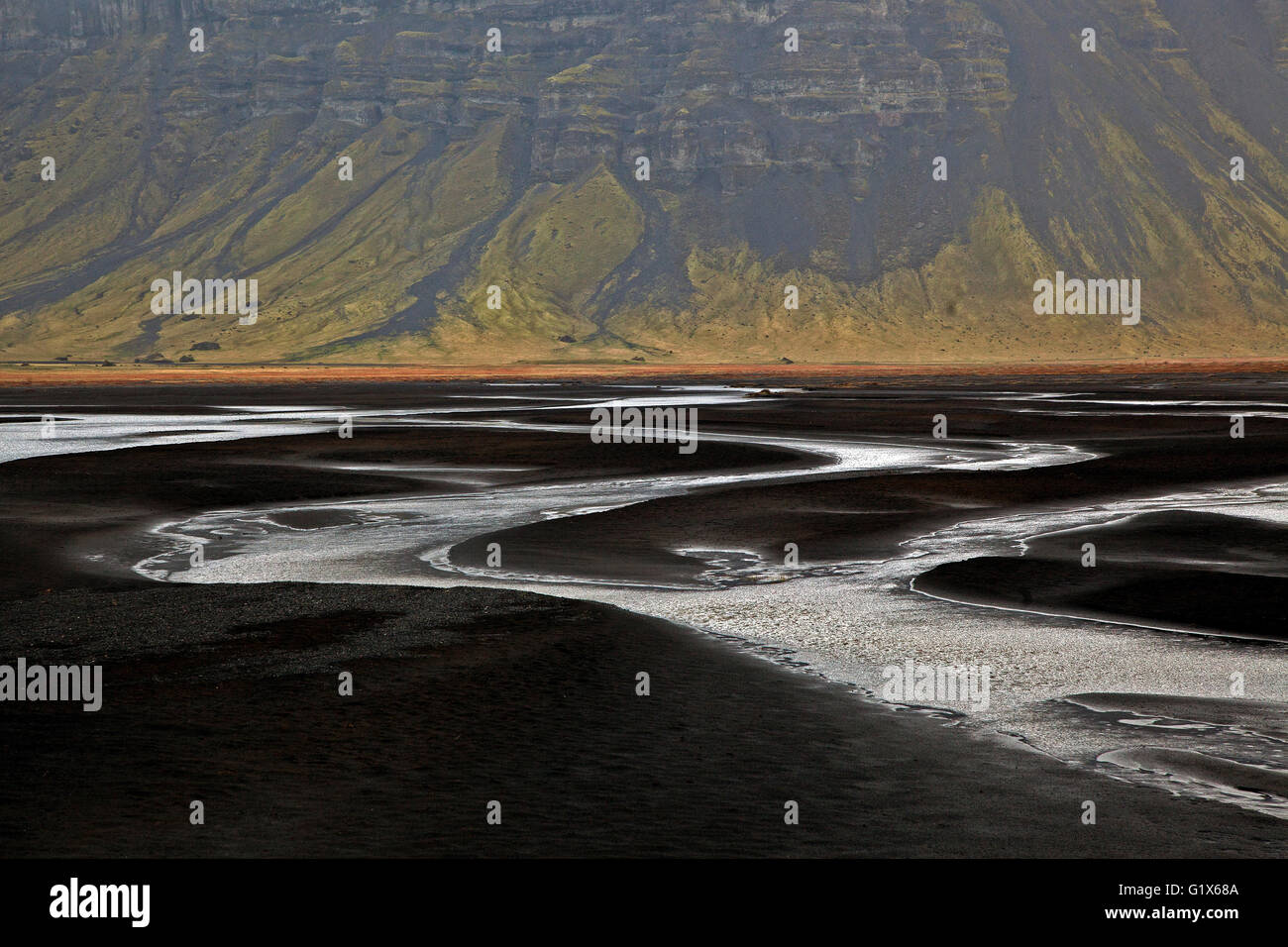 Landscape with watercourses through vulcanic sand, in Nupsstadur or Núpsstaður, Southern Region, Iceland Stock Photo