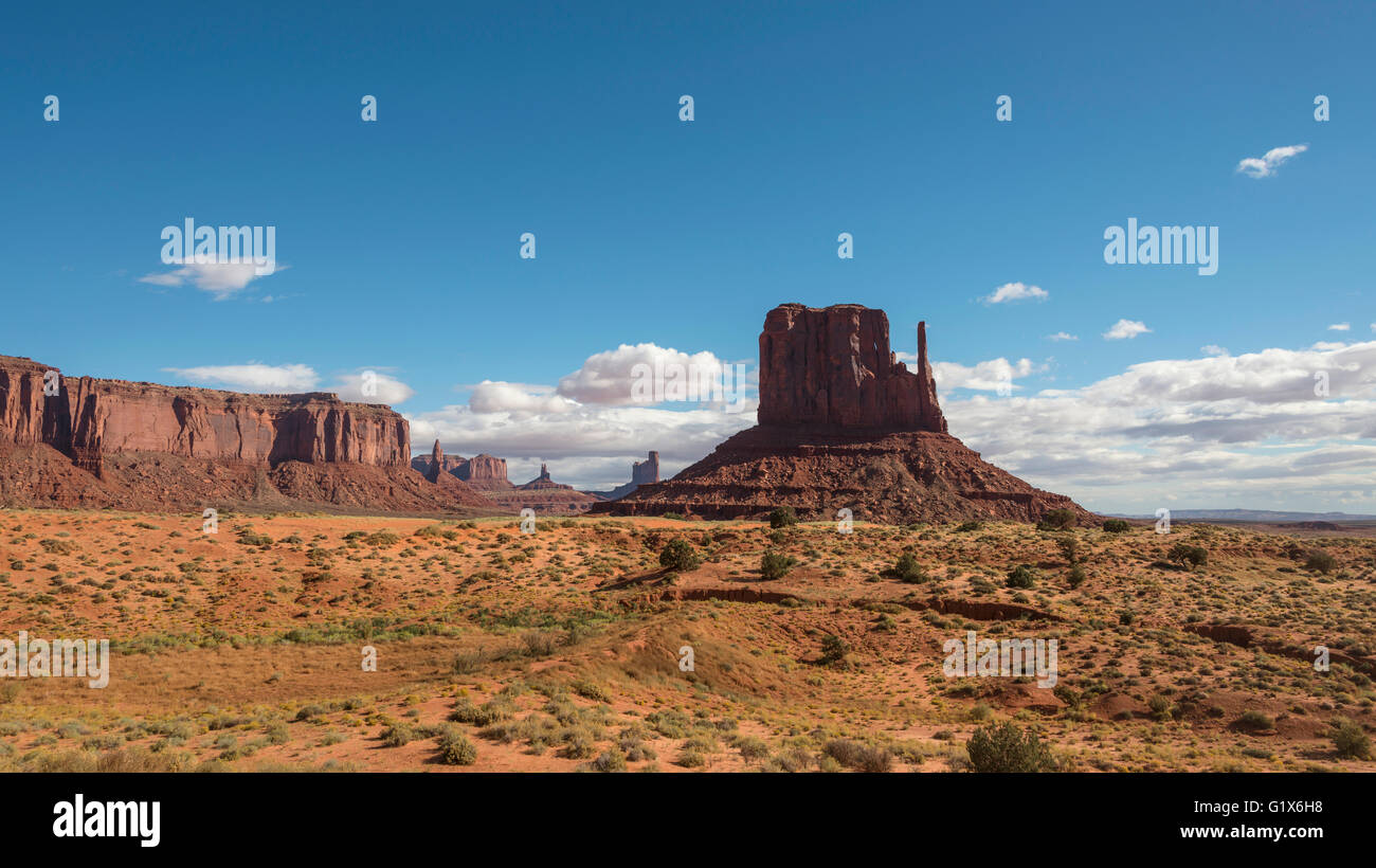 Scenic Drive, Monument Valley, blue sky with clouds Navajo Tribal Park, Navajo Nation, Arizona, Utah, USA Stock Photo