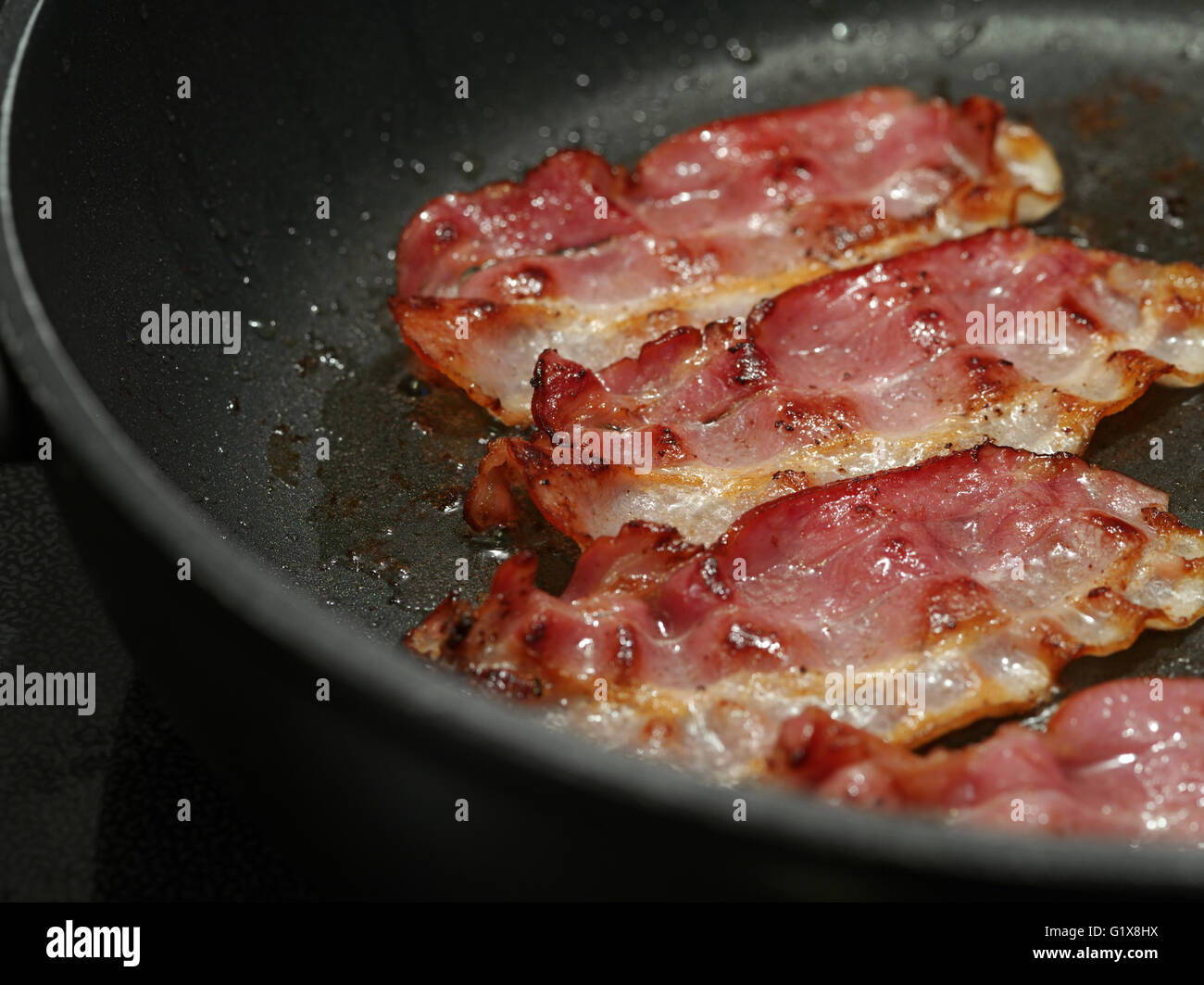 Sizzling bacon hires stock photography and images Alamy