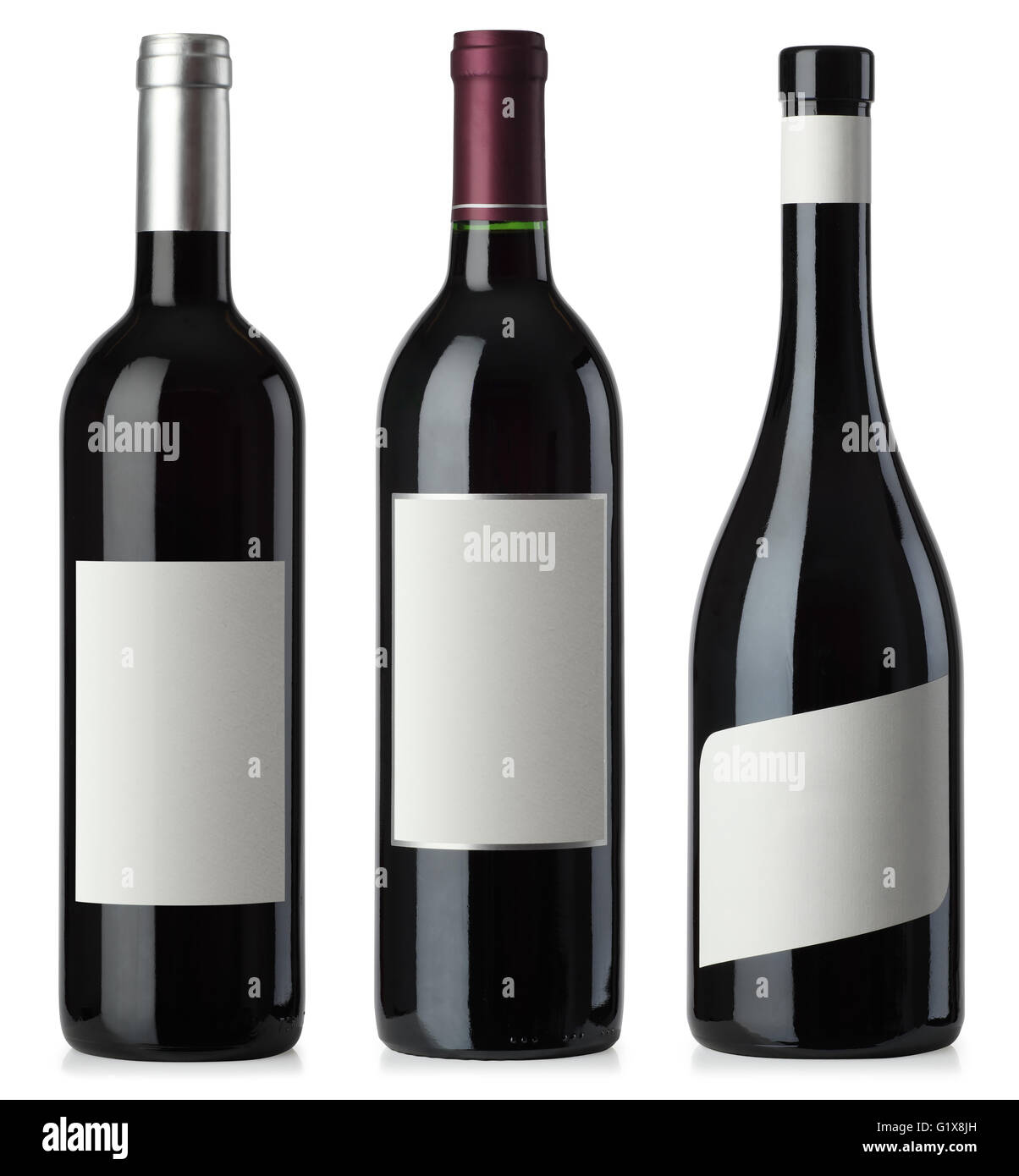 Three merged photographs of different shape red wine bottles with blank labels.  Separate clipping paths for bottles and labels Stock Photo