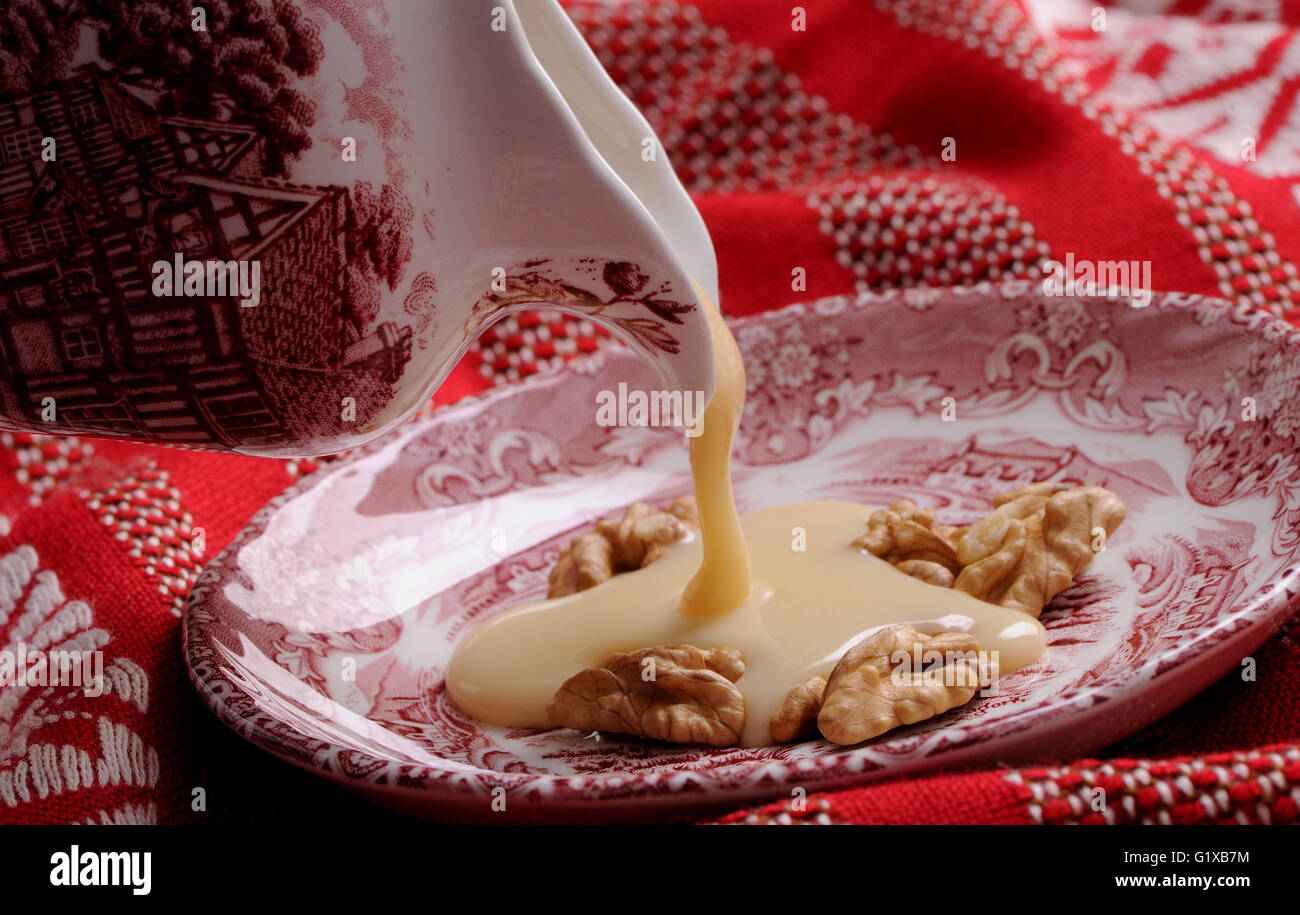 Dulce de leche with nuts Stock Photo