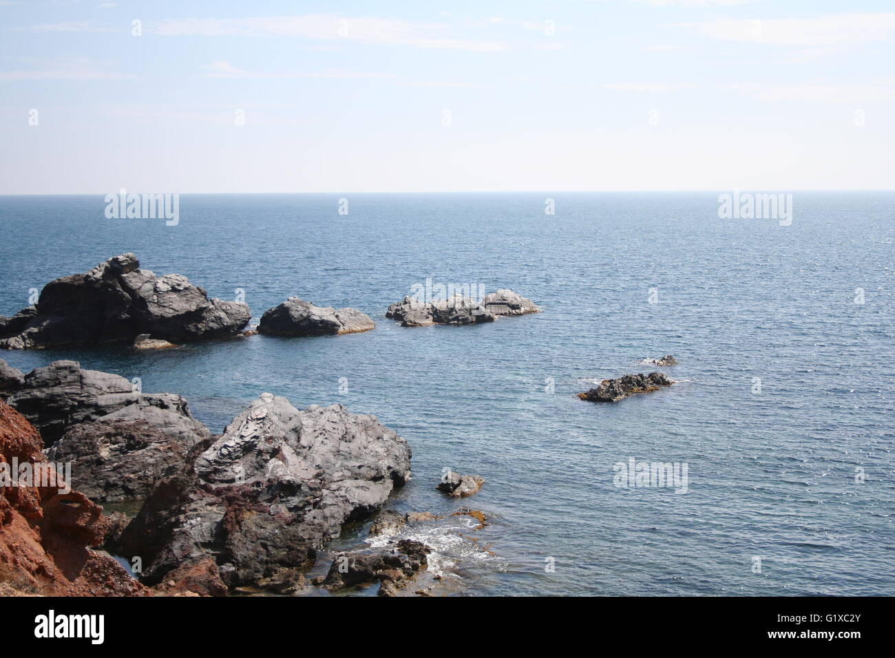 A sea view with rocks Stock Photo - Alamy