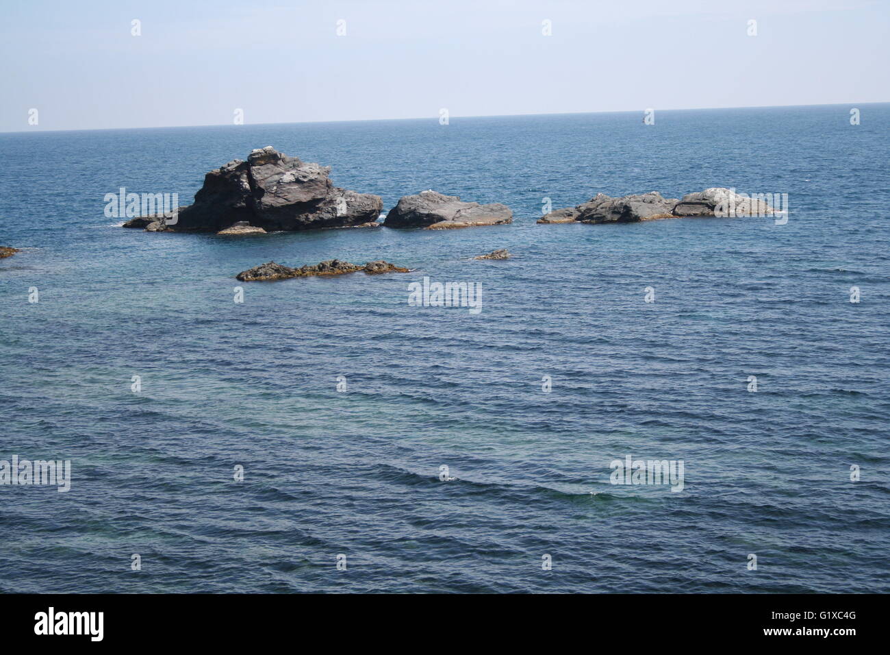 A sea view with rocks Stock Photo - Alamy