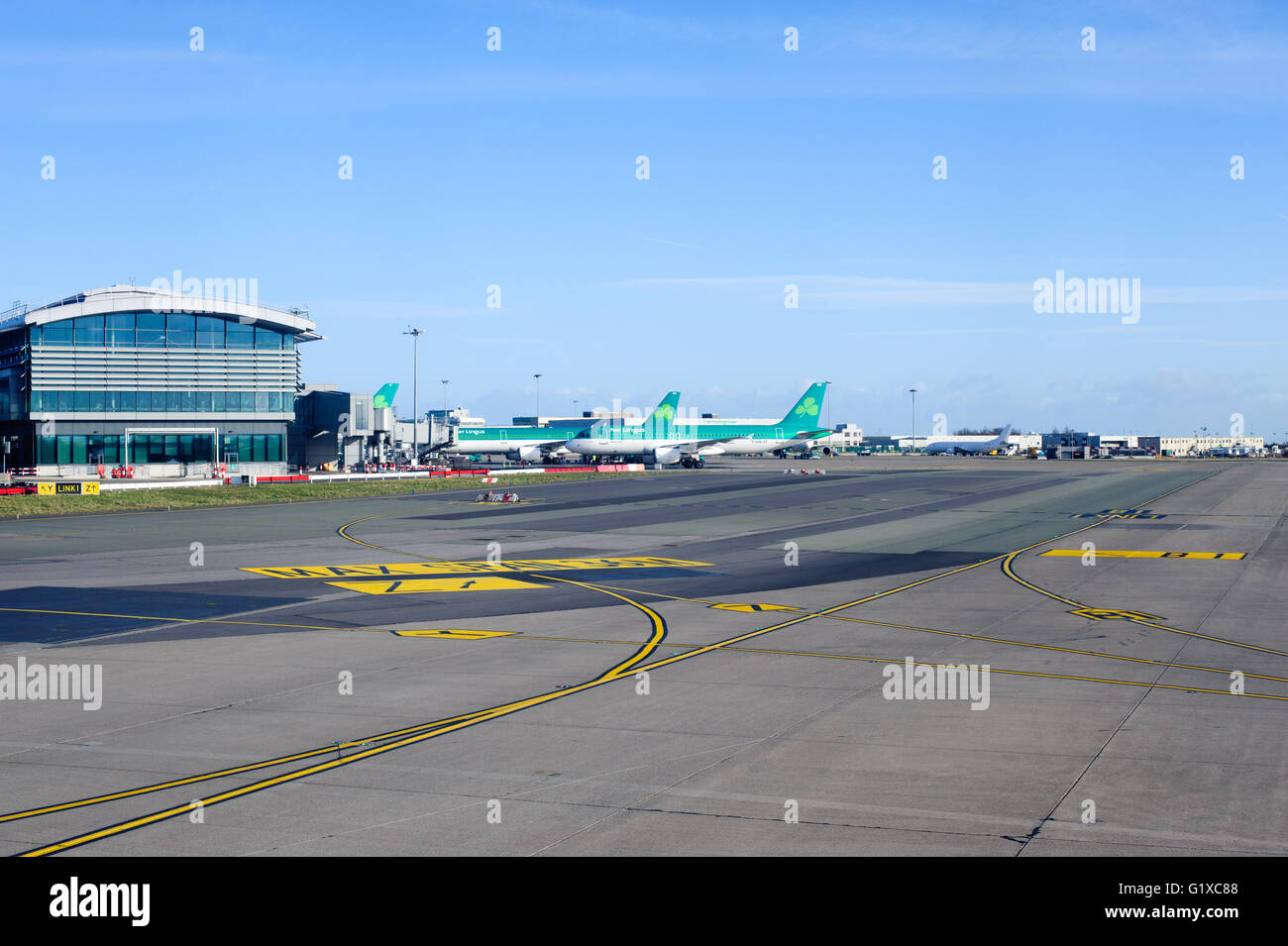 Dublin, Ireland - 01 February, 2015: Aer Lingus planes lined up at Terminal 2 at Dublin Airport Ireland Stock Photo