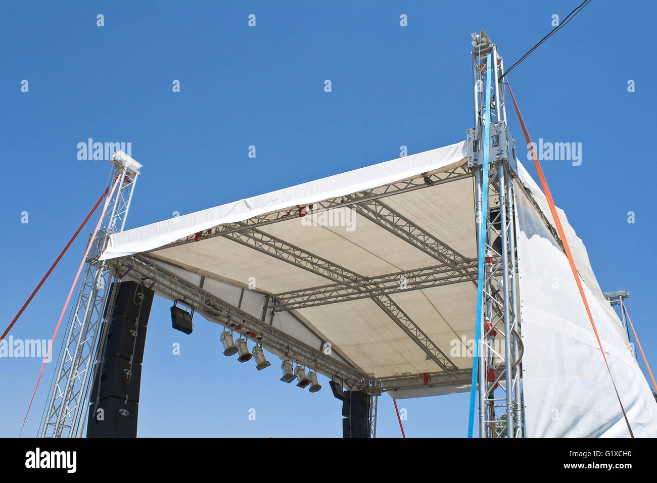 Outdoor concert stage construction over blue sky Stock Photo