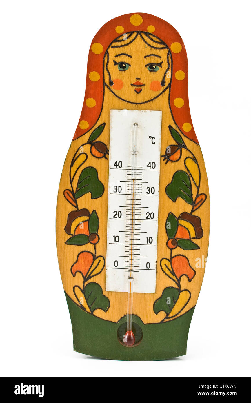 Babushka doll with thermometer isolated on white Stock Photo