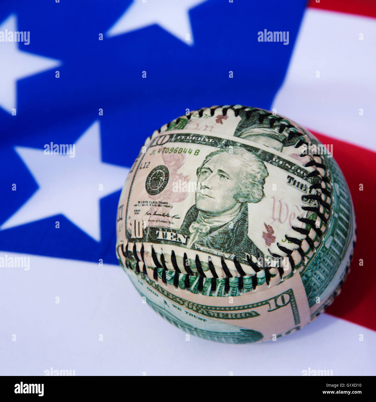 A baseball bearing the image of Alexander Hamilton, one of the Founding Fathers of the United States of America. Stock Photo
