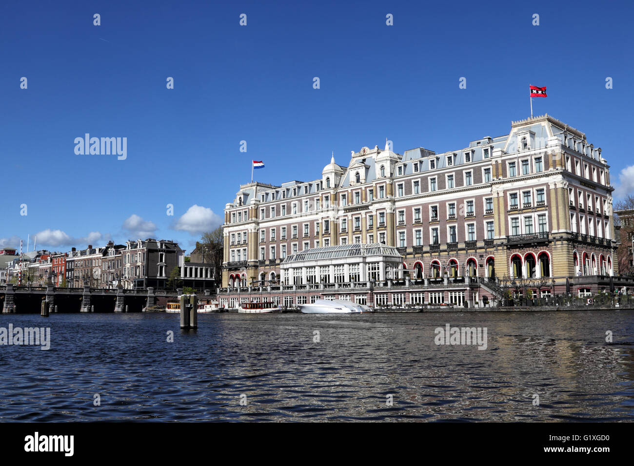 The Intercontinental Amstel Hotel at the Amstel river in downtown Amsterdam, Netherlands, Europe. Stock Photo