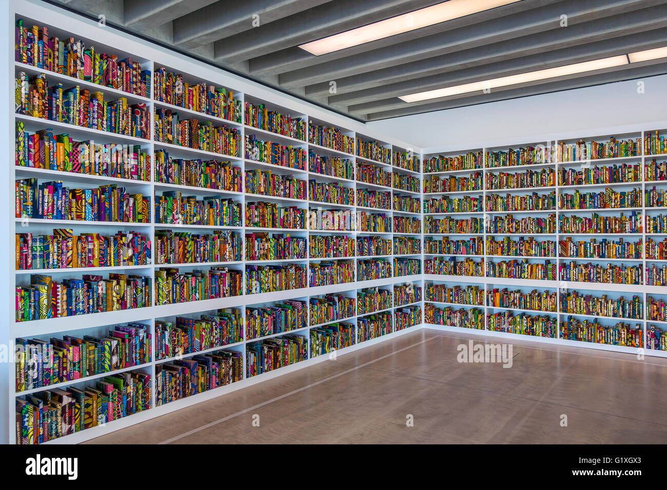 The British Library by Yinka Shonibare MBE Thousands of books covered in batik Dutch fabric with names of notable British people Stock Photo
