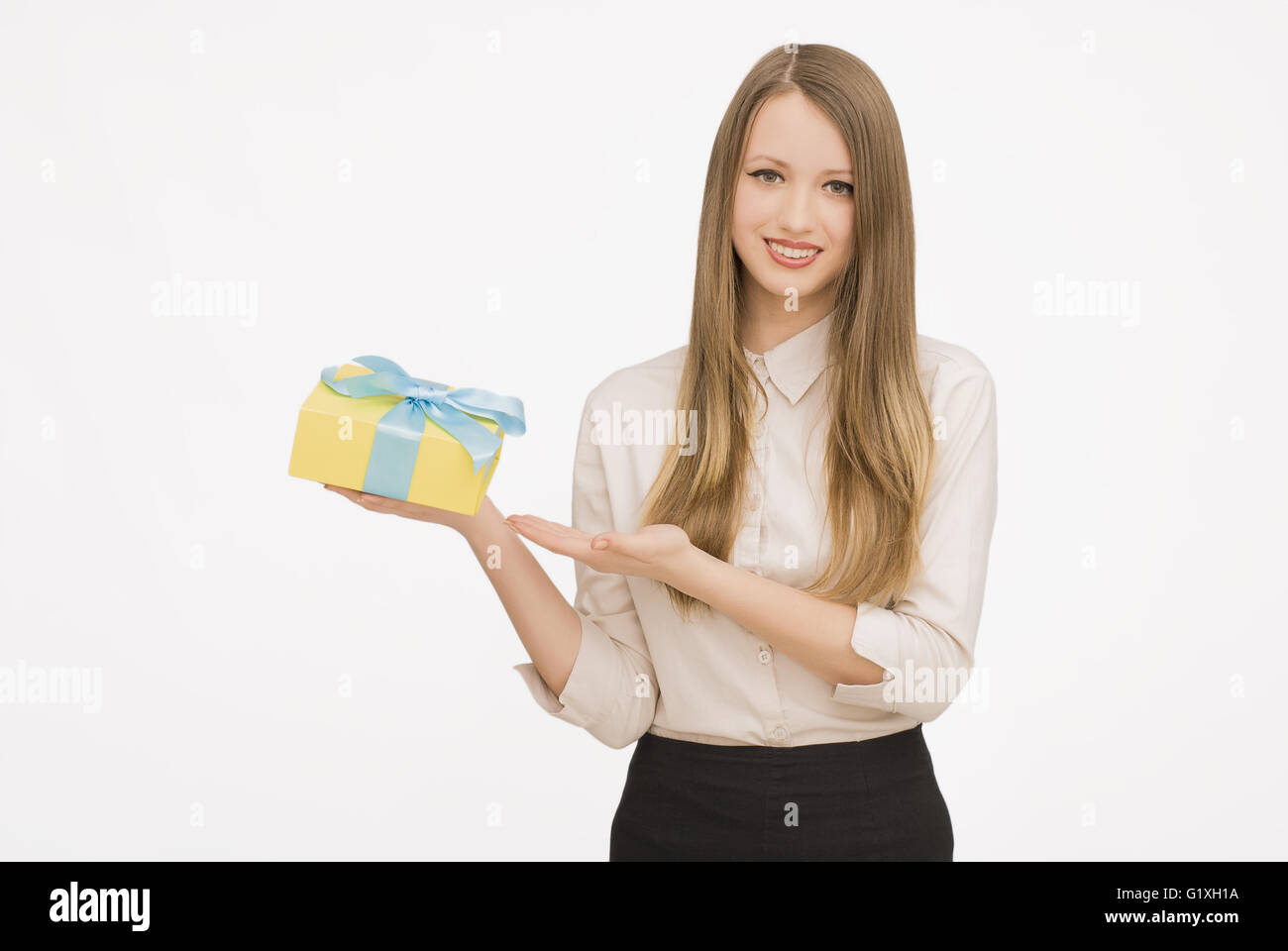 Young woman portrait holding gift Stock Photo - Alamy
