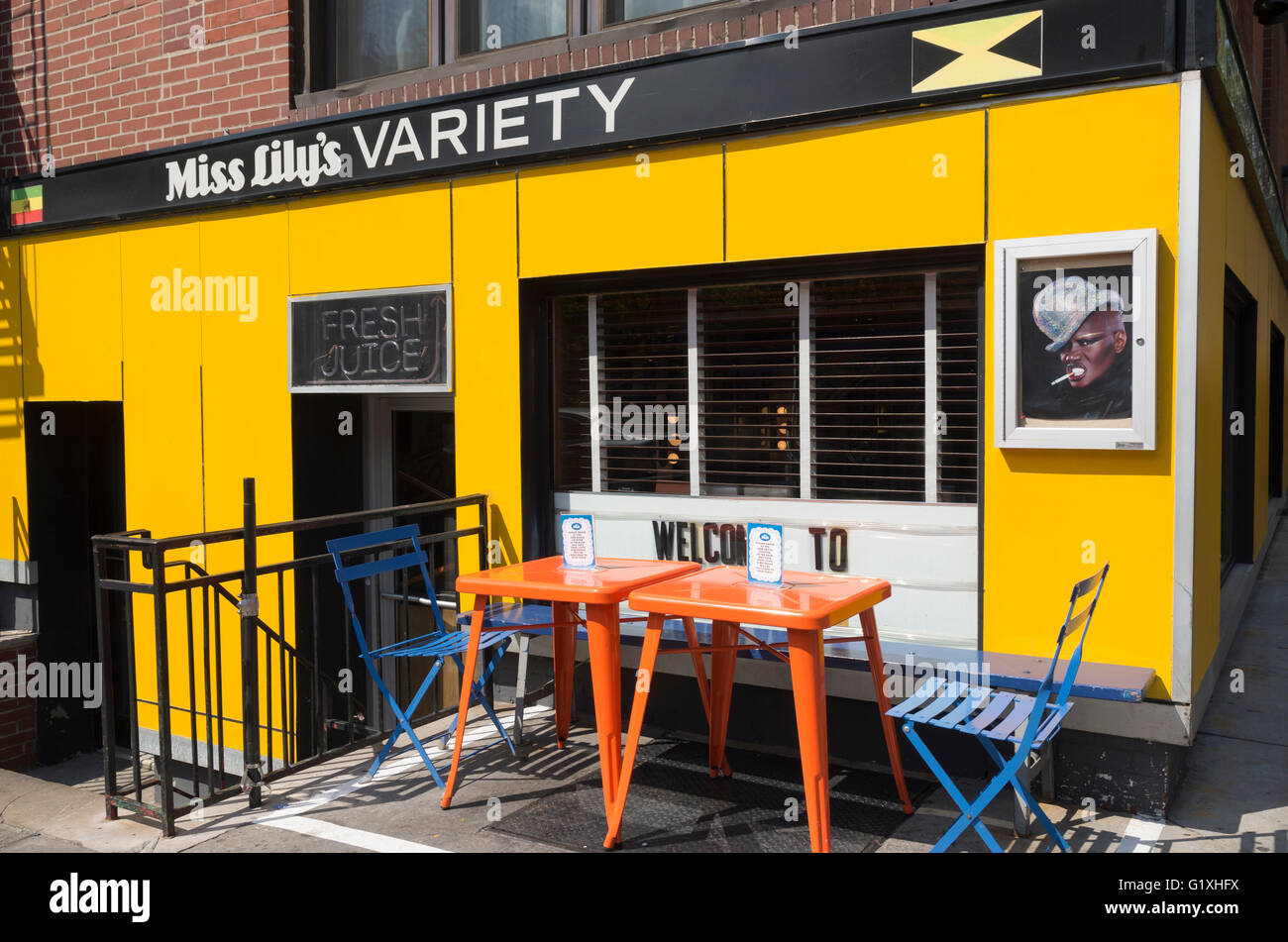 Exterior of Miss Lily's Variety; a Jamaican themed cafe popular for brunch, lunch and dinner in Soho, New York Stock Photo