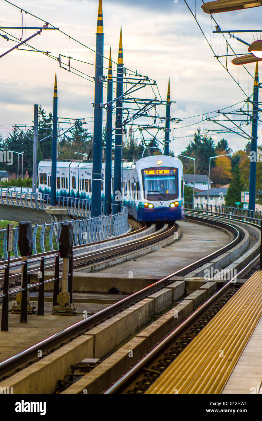 Sound Transit Link light rail train entering the Tukwila/International Boulevard Station Stock Photo