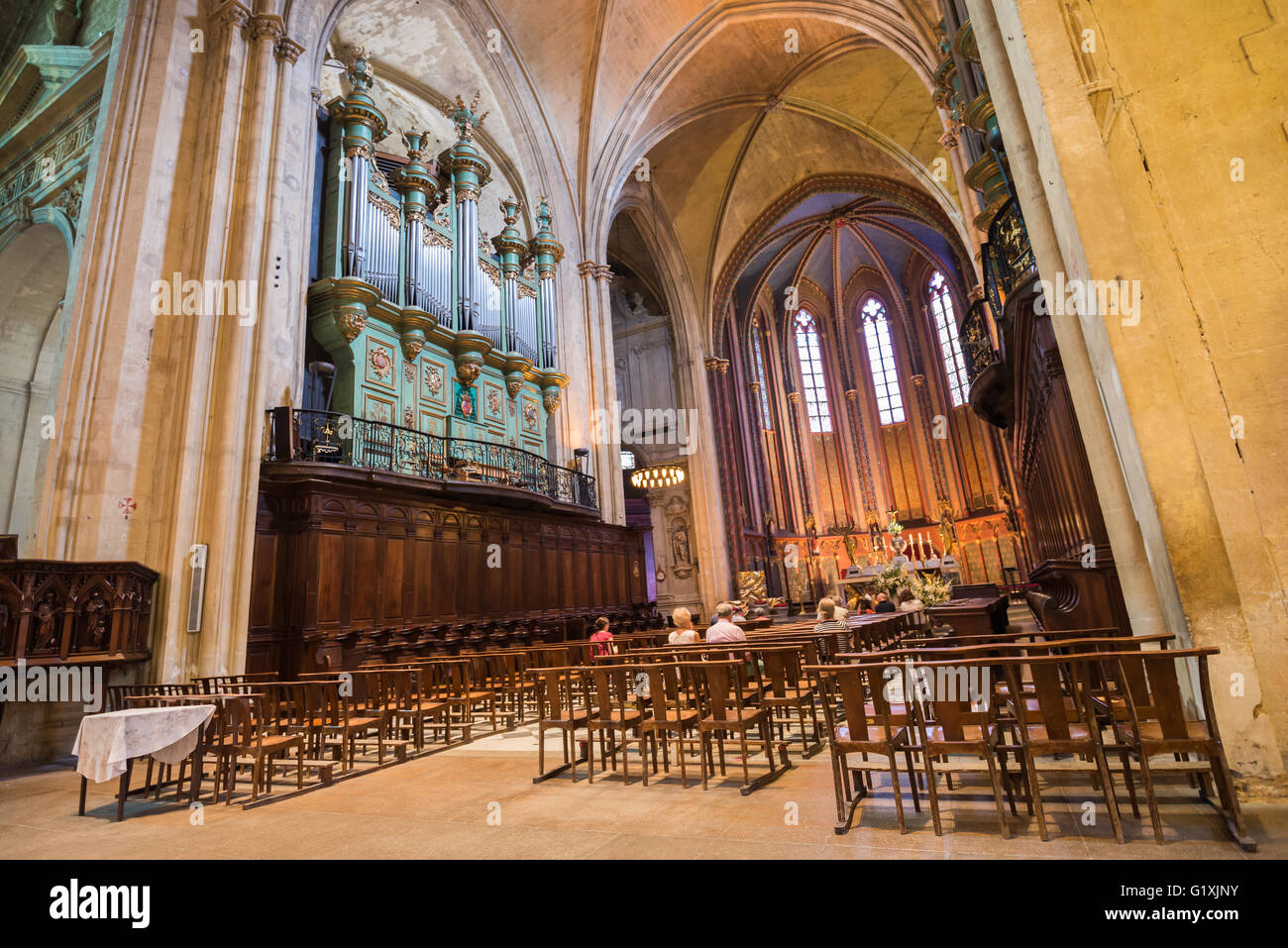 An impressive appeased interior of an ancient medieval cathedral Stock Photo