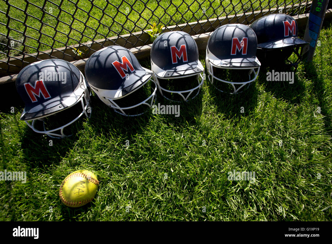 High School girls softball batting helmets Stock Photo