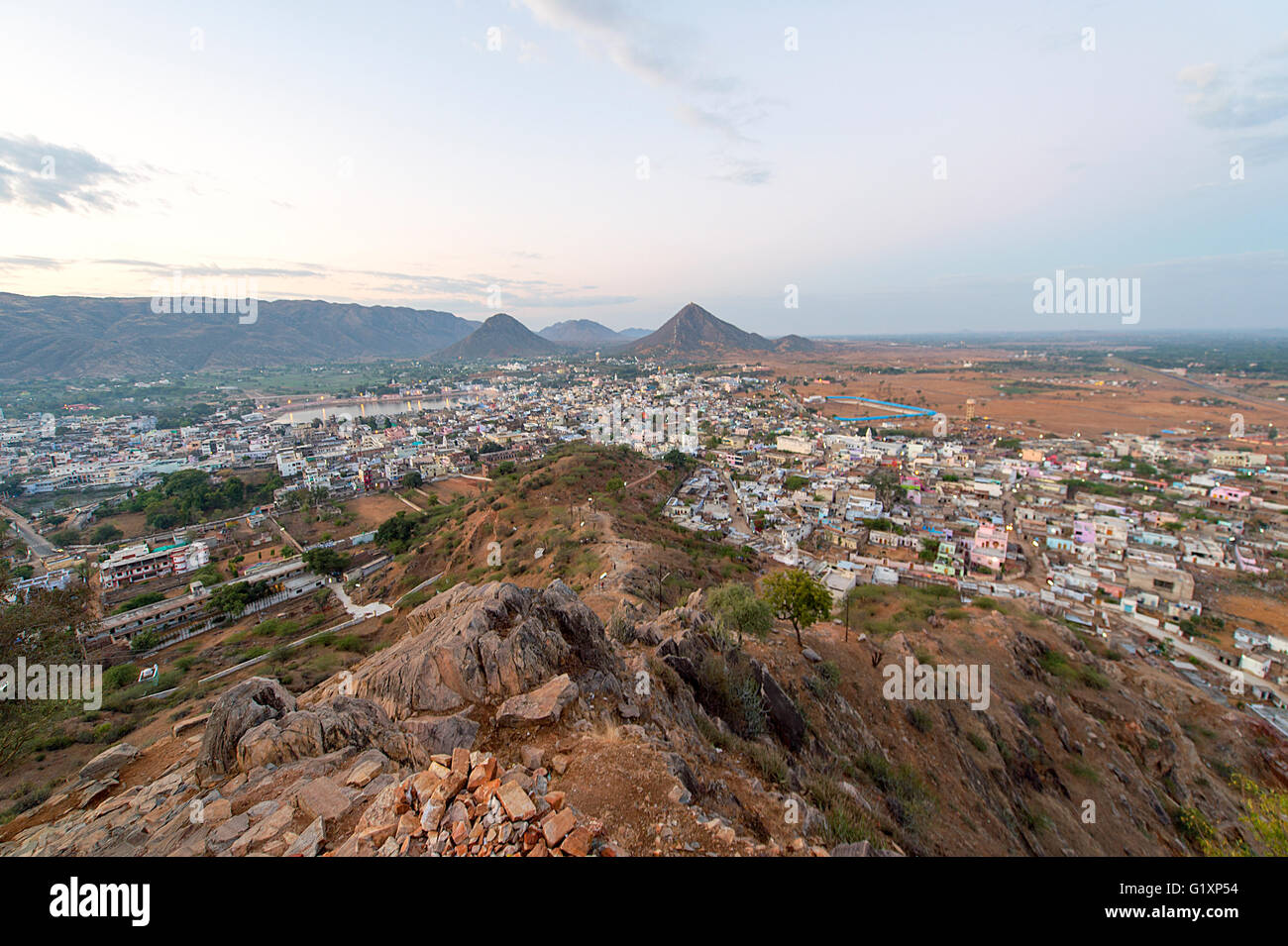 Aeriel view of Pushkar, India town after sunrise from Gayatri Temple during the dull weather. Stock Photo