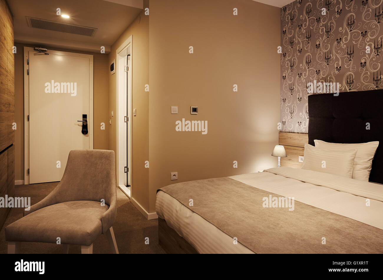 Empty hotel room, furniture details, modern design. Stock Photo