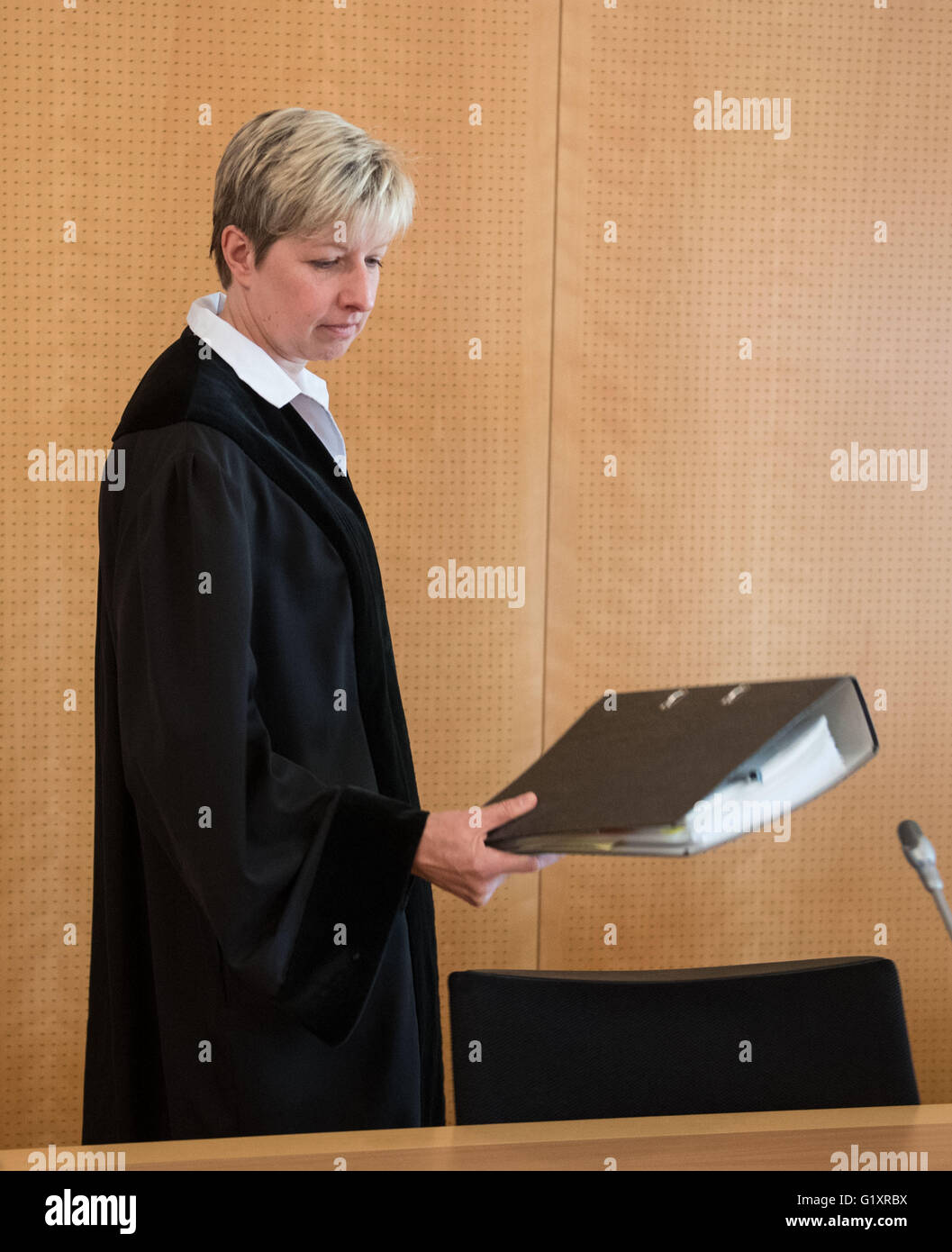 Detmold, Germany. 20th May, 2016. Presiding judge, arrives for a session in the trial against Reinhold Hanning in Detmold, Germany, 20 May 2016. The 94-year-old World War II SS guard is facing a charge of being an accessory to at least 170,000 murders at Auschwitz concentration camp. Prosecutors state that he was a member of the SS 'Totenkopf' (Death's Head) Division and that he was stationed at the Nazi regime's death camp between early 1943 and June 1944. Photo: BERND THISSEN/dpa/Alamy Live News Stock Photo