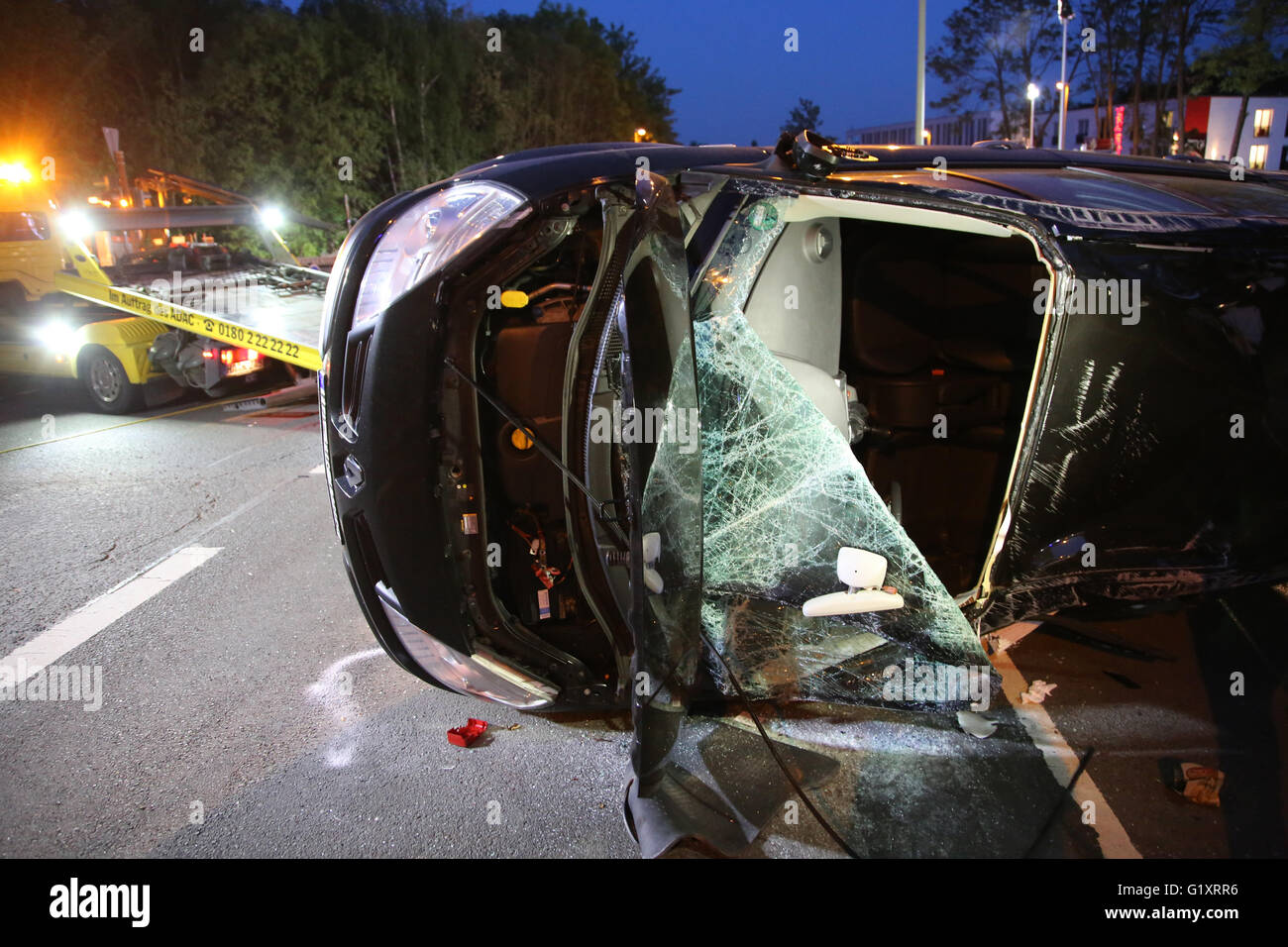Hagen, Germany. 19th May, 2016. A destroyed car is seen after a crash