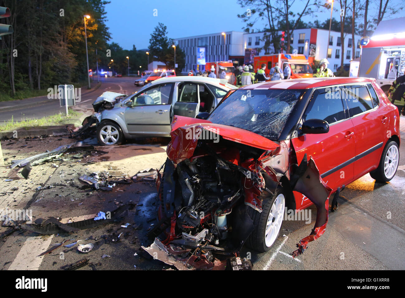 Hagen, Germany. 19th May, 2016. Two destroyed cars are seen after a