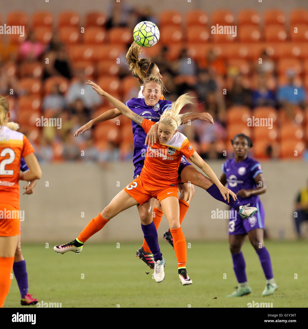 Houston, TX, USA. 20th May, 2016. Houston Dash midfielder Cami Privett (23) and Orlando Pride midfielder Becky Edwards (14) battle for possession of the ball in midair during the second half of the NWSL women's soccer match between the Houston Dash and the Orlando Pride from BBVA Compass Stadium in Houston, TX. Credit image: Erik Williams/Cal Sport Media/Alamy Live News Stock Photo
