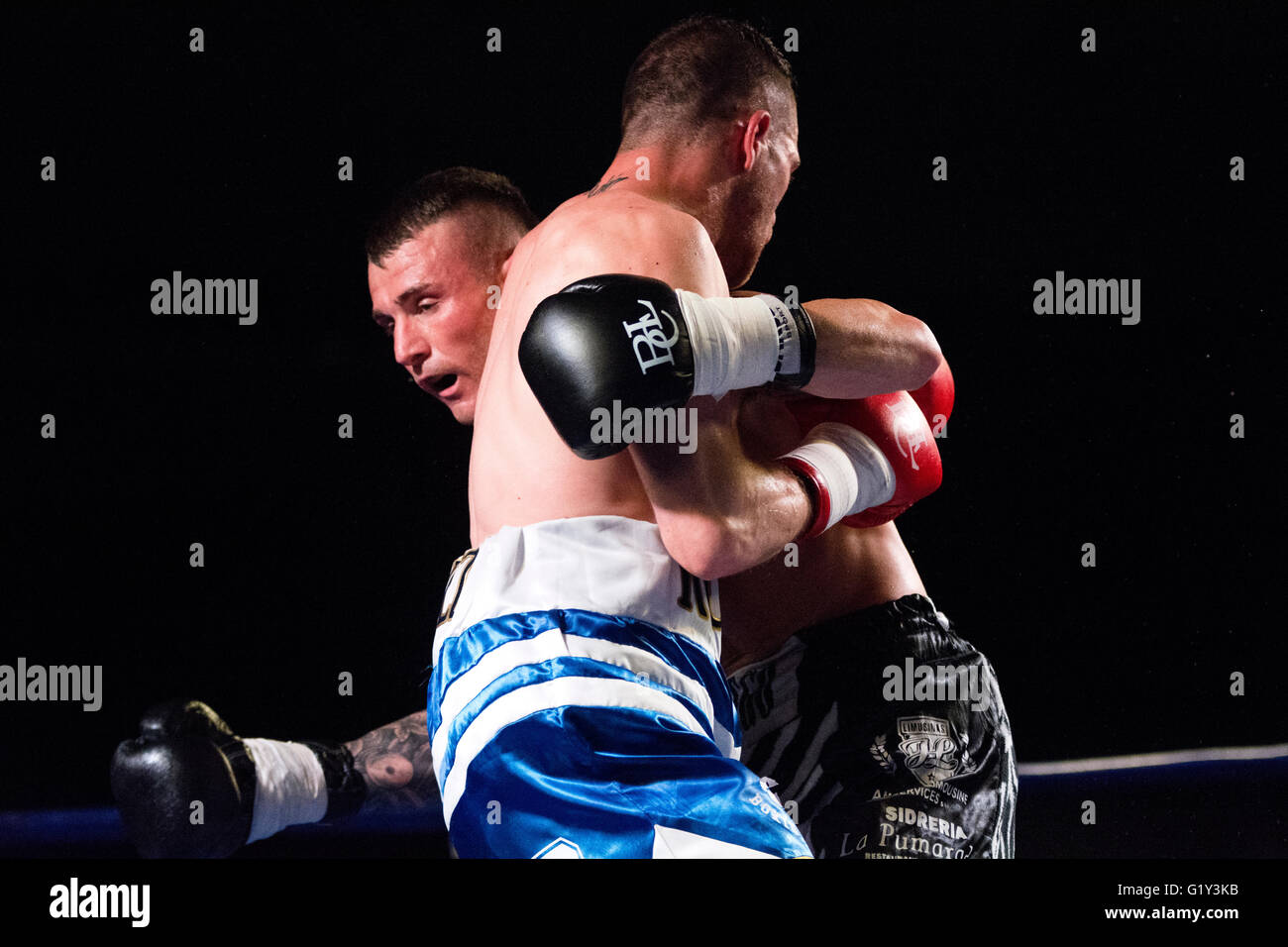 Gijon, Spain. 21st May, 2016. Pablo Fuego hugs to Ruben Dominguez during the third boxing match of the fight night of Spanish national featherweight boxing championships at Sports Center on May 21, 2016 in Gijon, Spain. Credit: David Gato/Alamy Live News Stock Photo