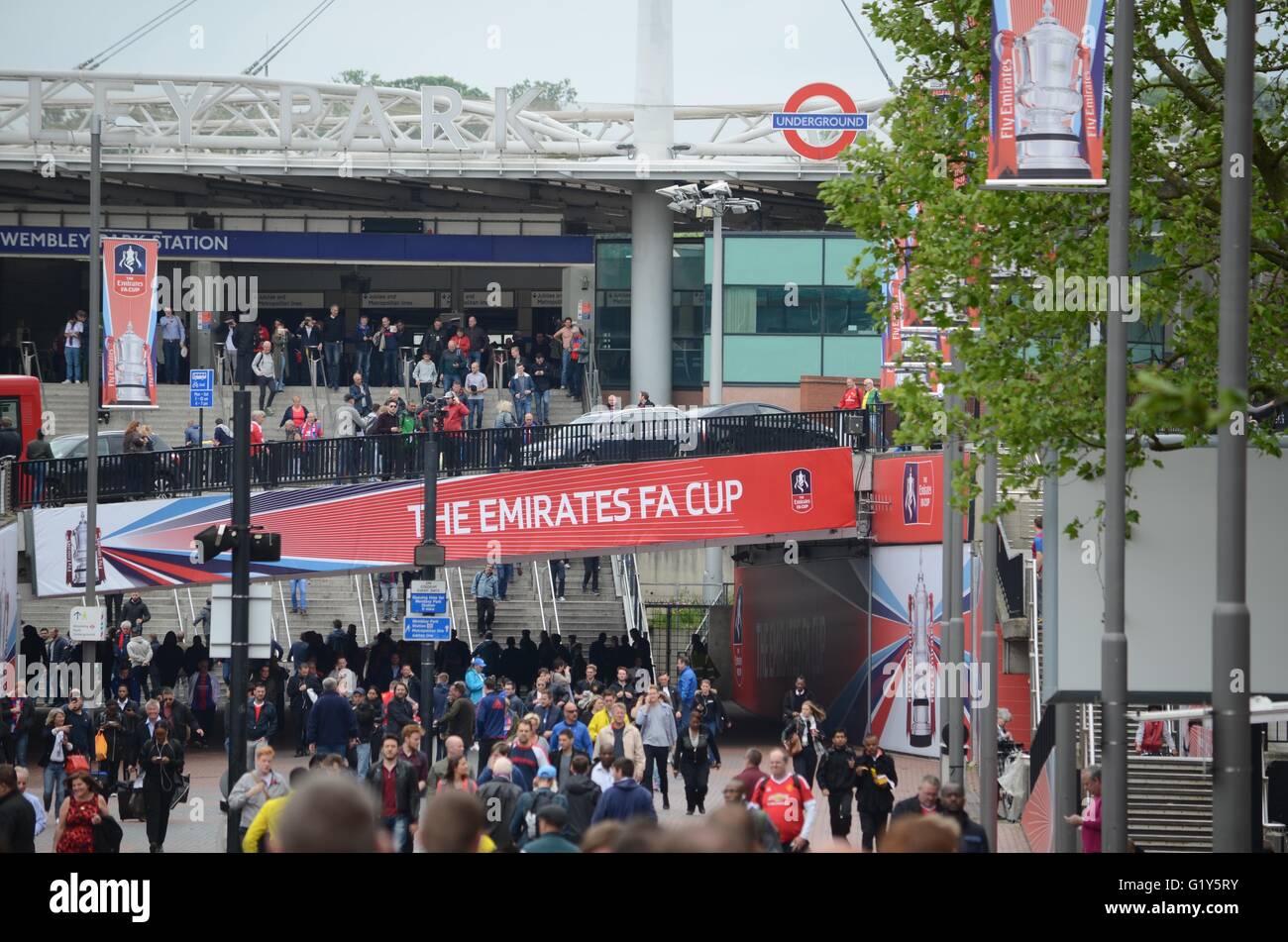 Wembley, UK. 21st May 2016. Fans arrive ahead of the anticipated FA Cup Final game between Crystal Palace and Crystal Palace. Credit: Marc Ward/Alamy Live News Stock Photo
