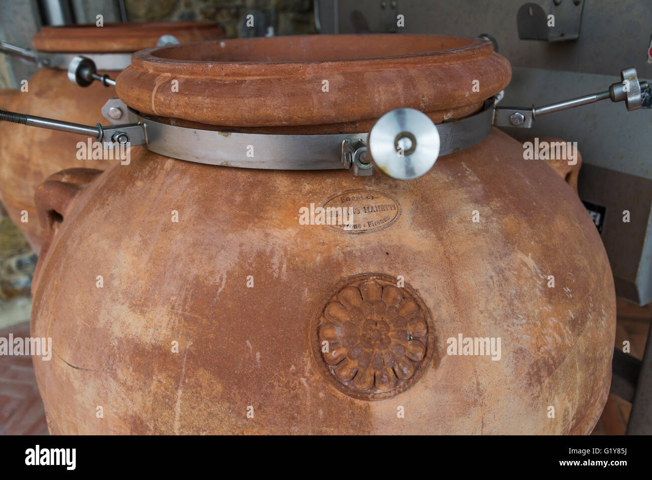 fermentation of red wine 'Dino' in amphora in Tuscan winery Fontodi, Panzano (Greve in Chianti) Stock Photo