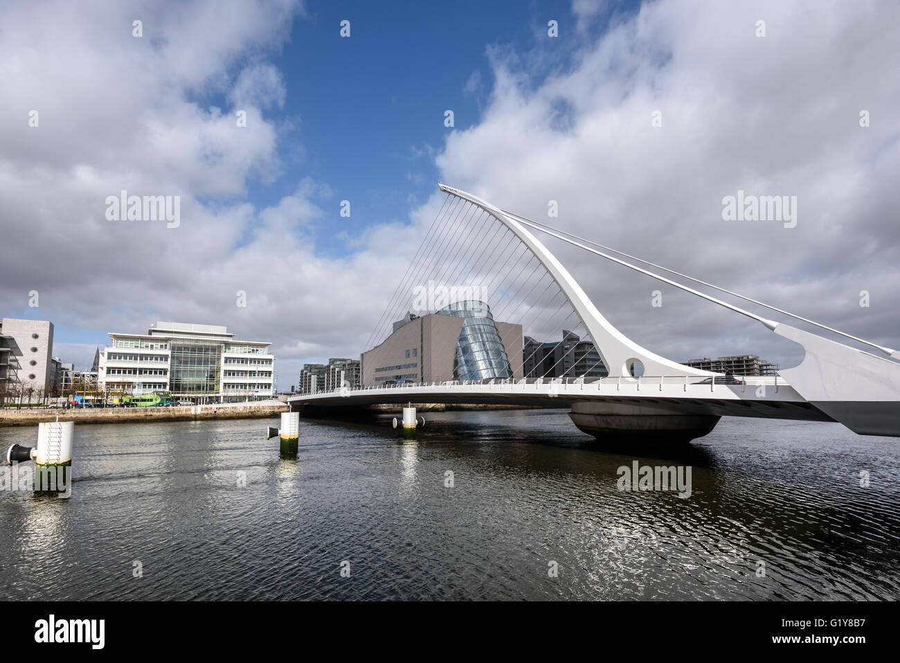Samuel Beckett Bridge is a cable-stayed bridge in Dublin that joins  River Liffey to Guild Street and North Wall Stock Photo