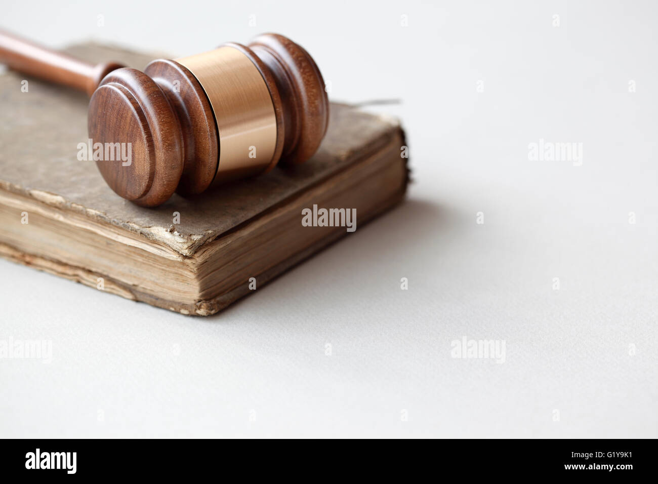 Very old law book with gavel Stock Photo Alamy
