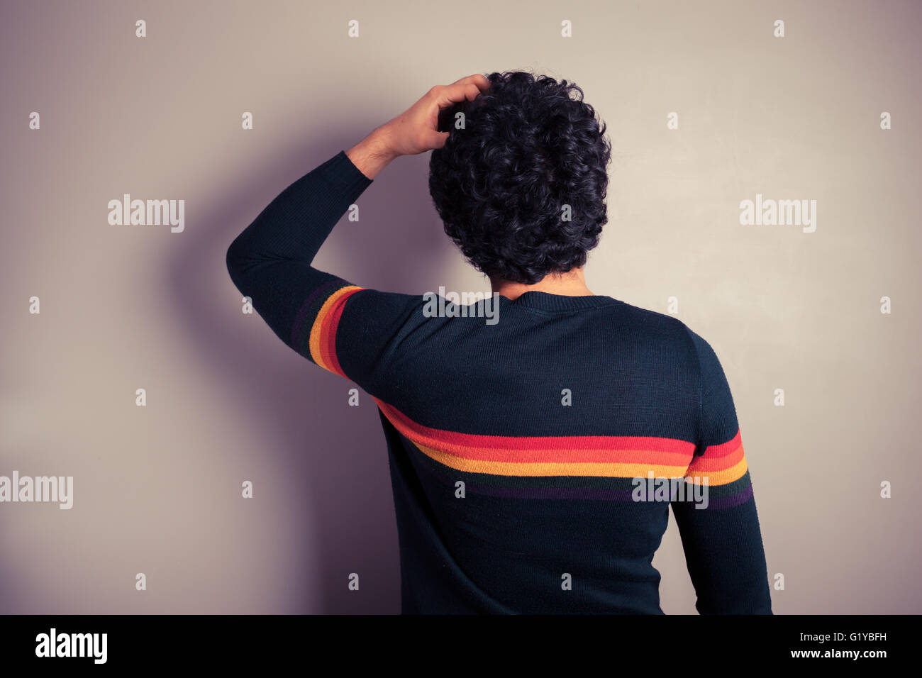 Scratching head confused hi-res stock photography and images - Alamy
