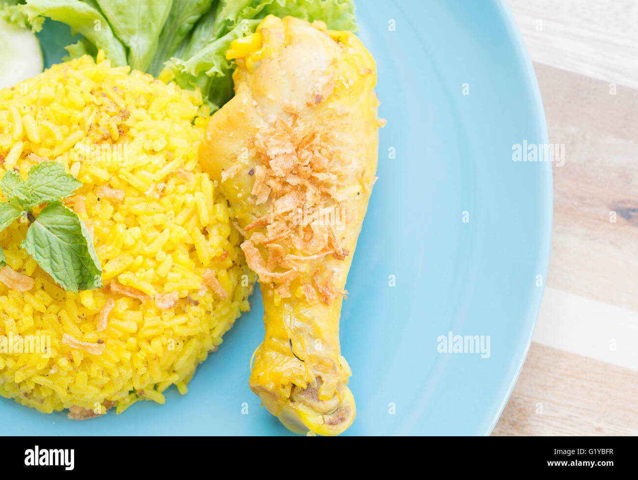 Halal food, Chicken Biryani with green chutney Stock Photo Alamy