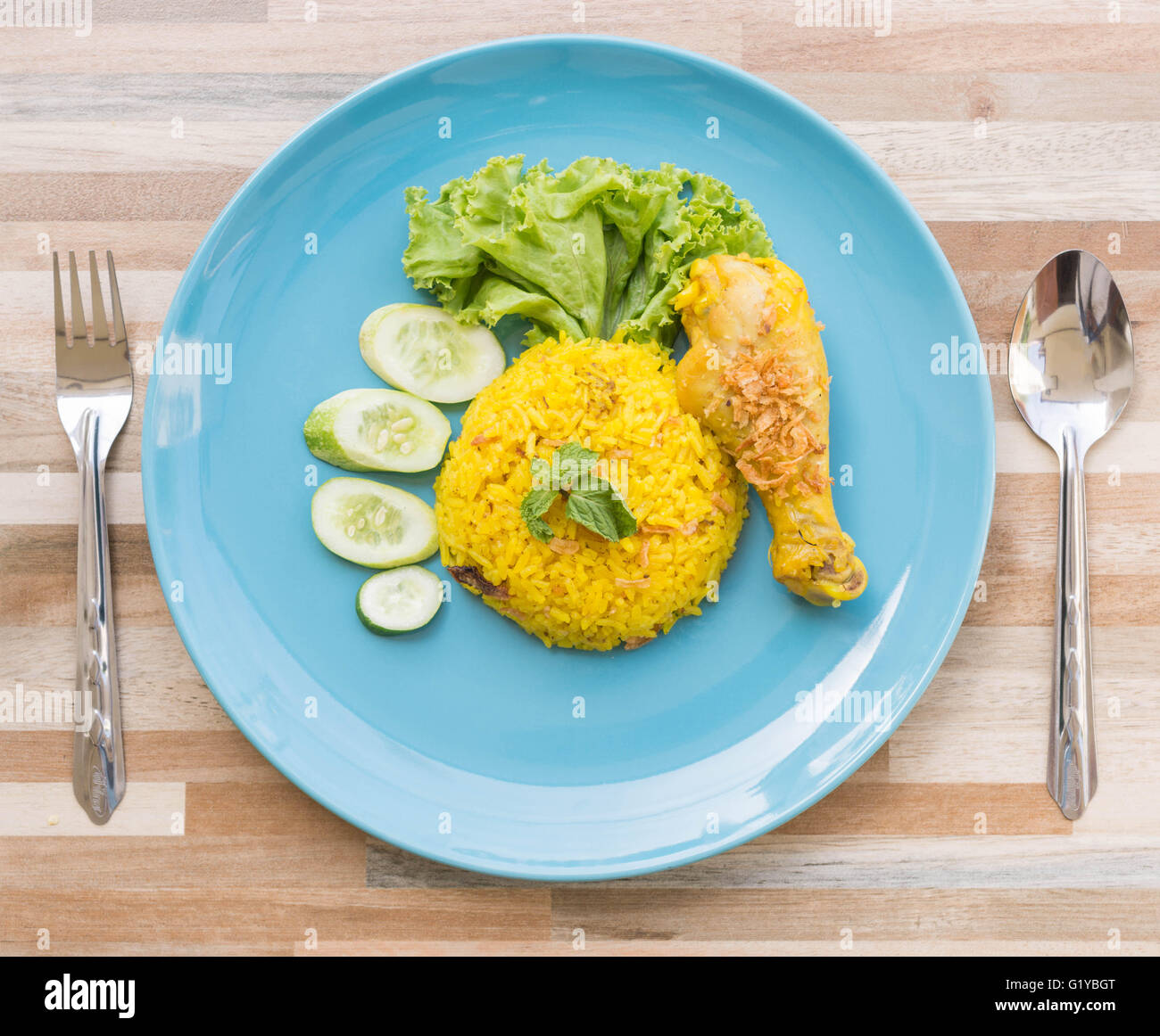 Halal food, Chicken Biryani with green chutney Stock Photo Alamy