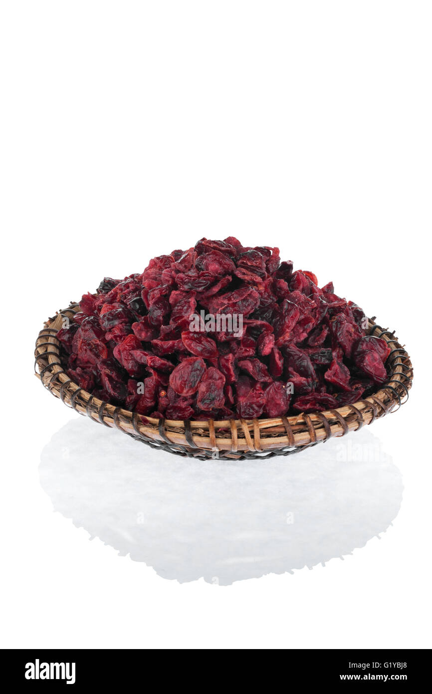 Dried cranberry on the plate  isolated on a white background Stock Photo