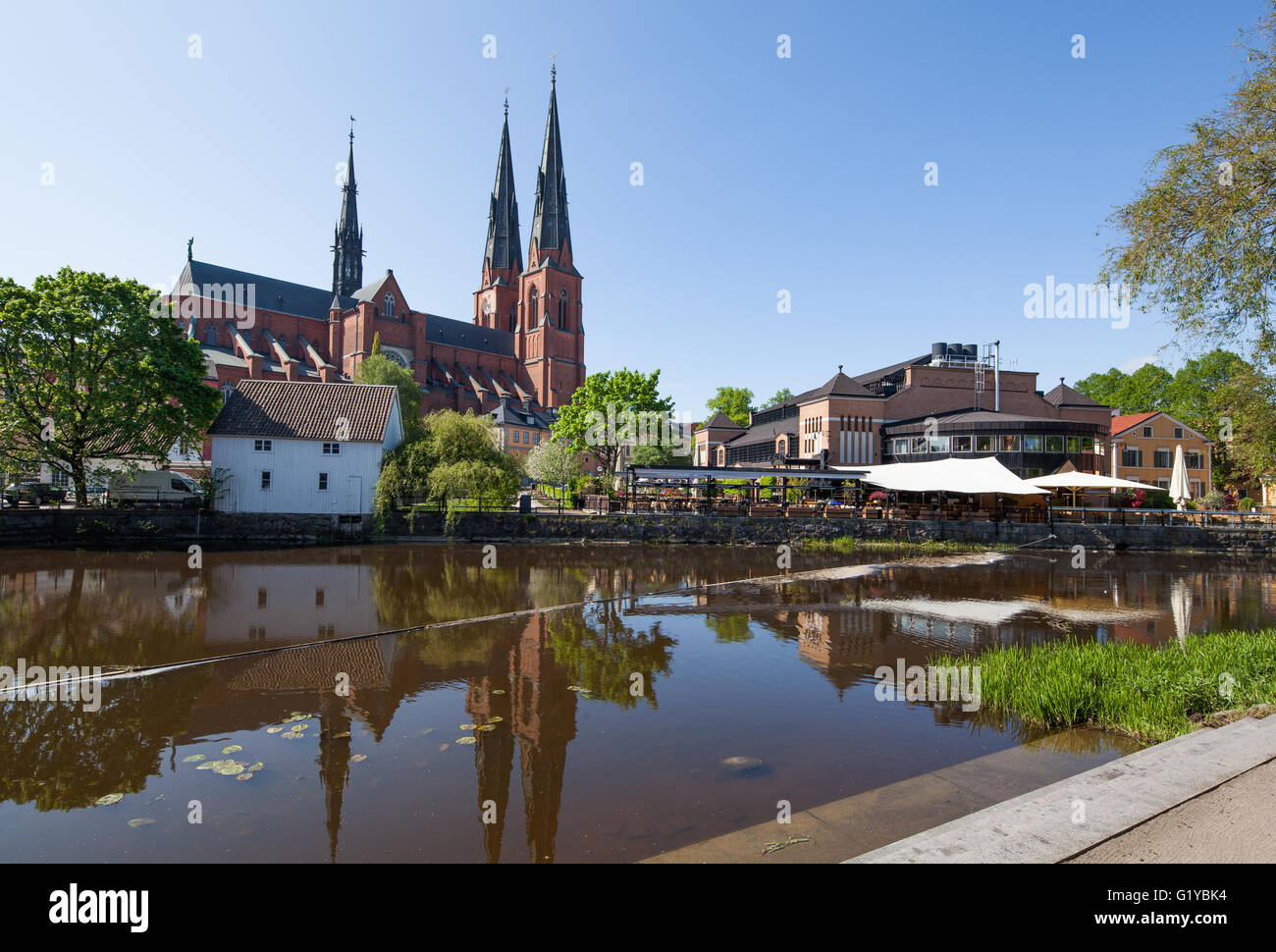Uppsala, Sweden - May 20, 2016 : Uppsala Church with its reflection on the river. Stock Photo