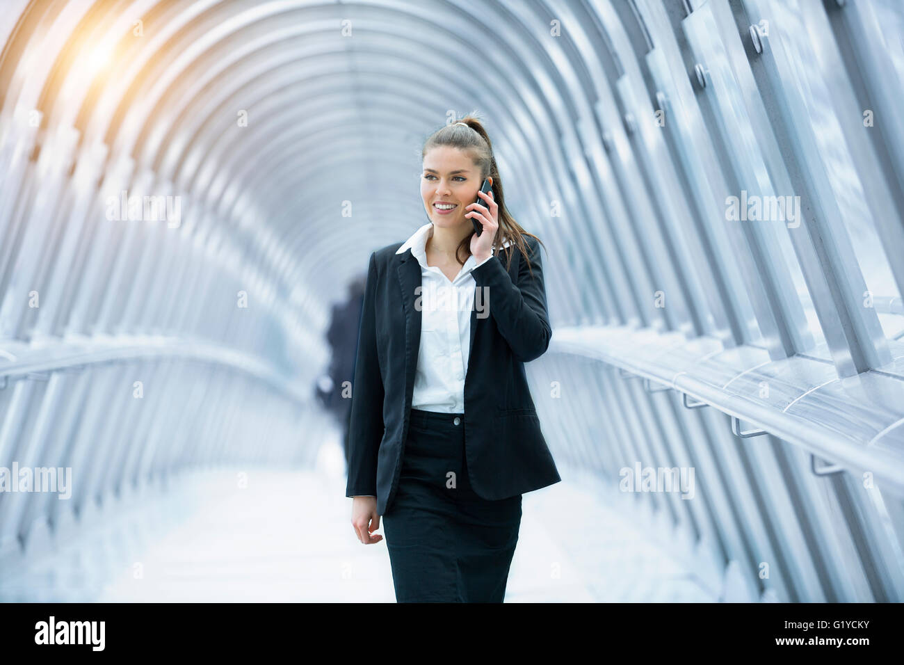 Businesswoman talking on mobile phone Stock Photo