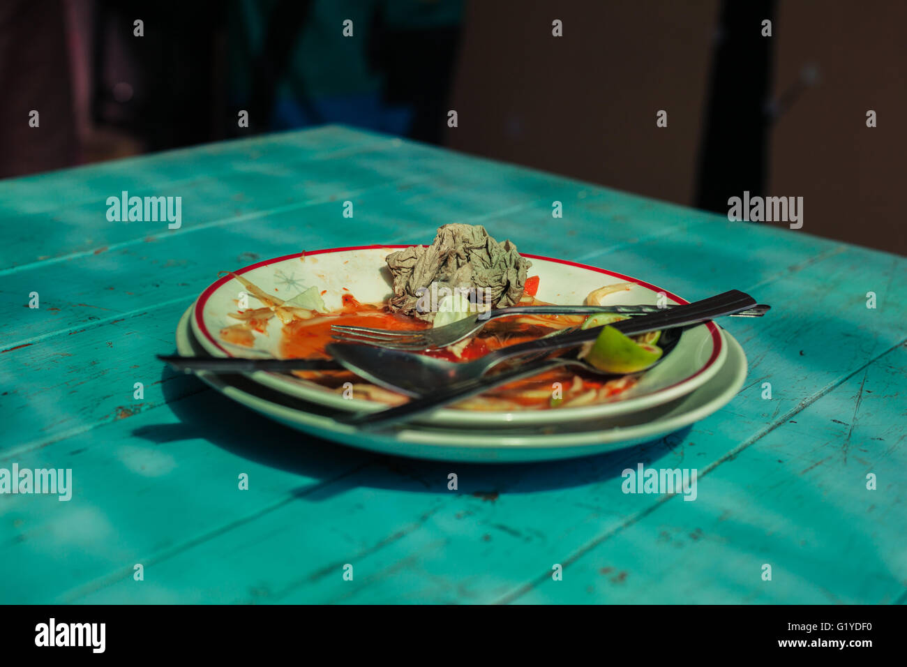 Leftover food on stacked plates in a restaurant Stock Photo Alamy