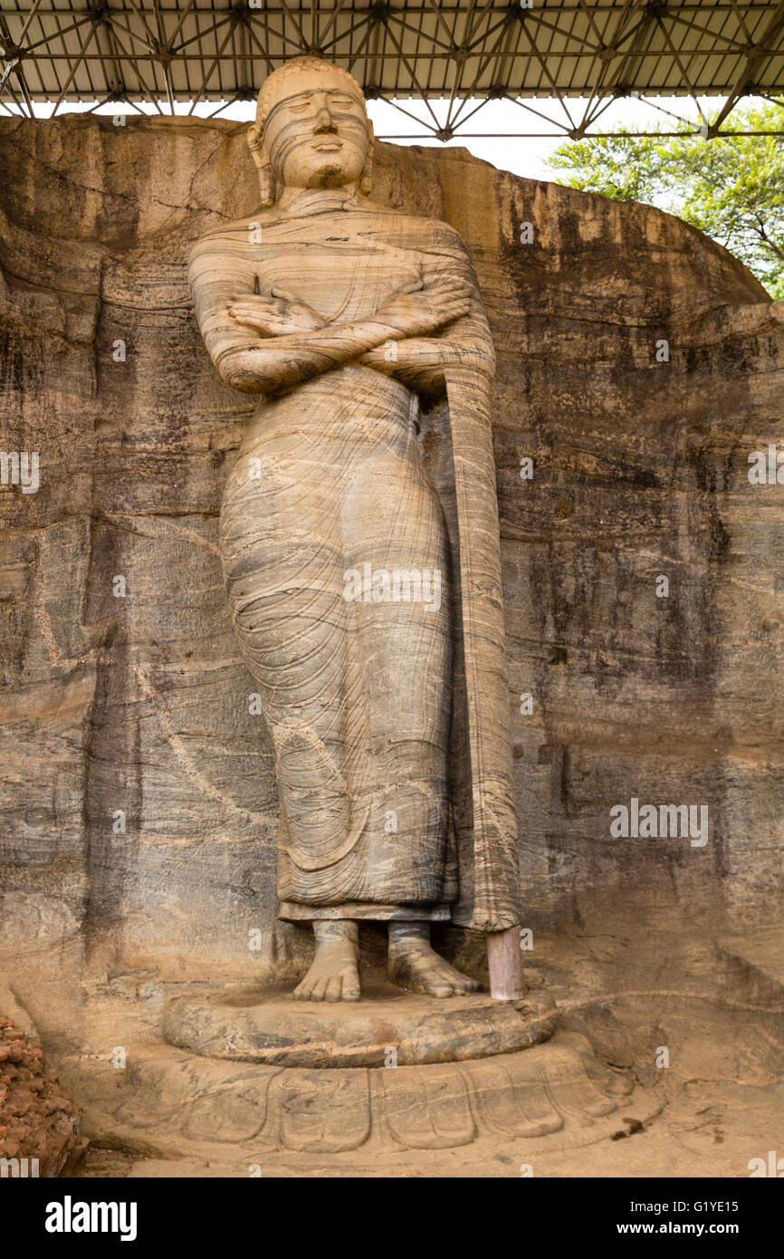 Standing Buddha statue, which depicts an unusual Mudra, Gal Vihara Pilima, Nissankamallapura, North Central Province, Sri Lanka Stock Photo