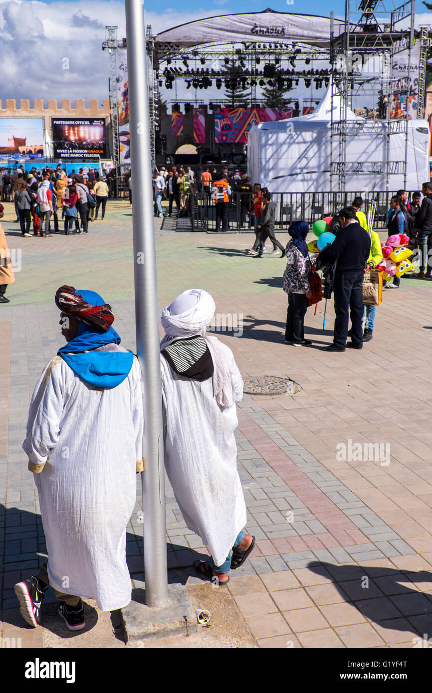 Audience members and main stage in the town's main square at the Essaouira music festival in Morocco Stock Photo