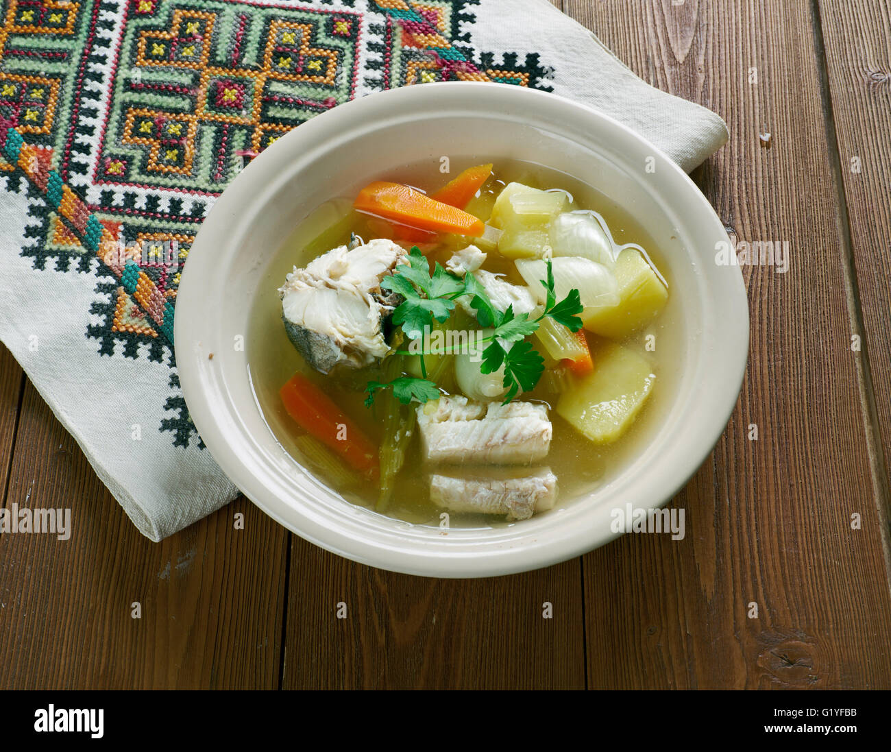 Russian fish soup - royal Ukha. with cod and sturgeon in the chicken ...