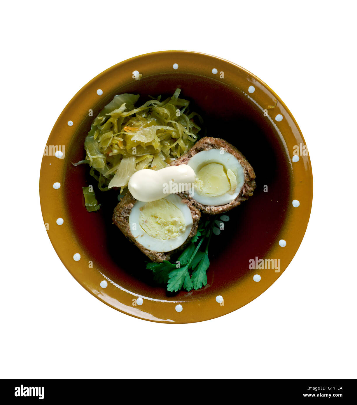 albondigas sorpresa Hardboiled egg wrapped in sausage meat.Spanish