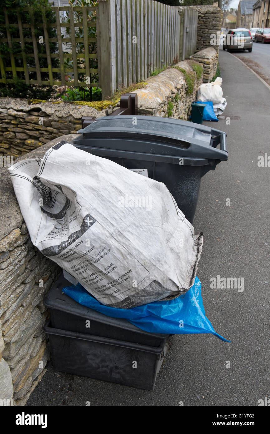 Rubbish and recycling bags on a street in Fairford, Gloucestershire; UK Stock Photo