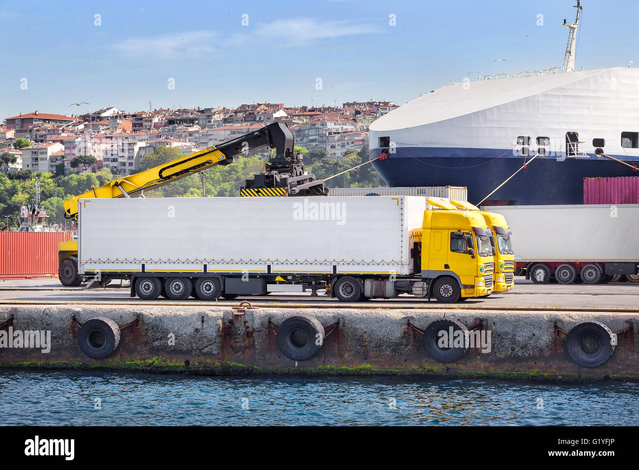 Truck unloading in a port on the Sea Stock Photo
