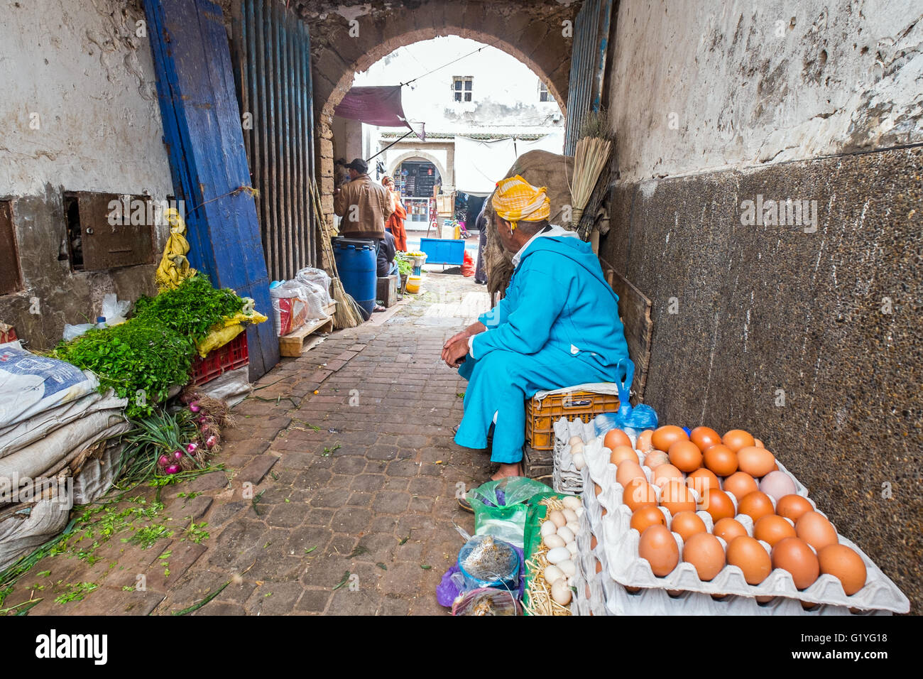 Moroccans merchant Inside the bustling medina (old town) of Essaouira, Morocco Stock Photo