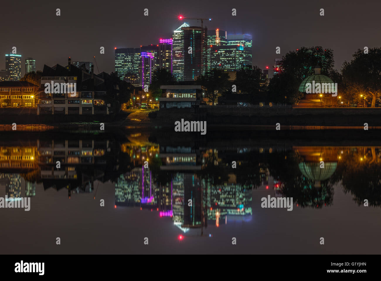 Canary Wharf view at night from Greenwich Pier, London Stock Photo - Alamy
