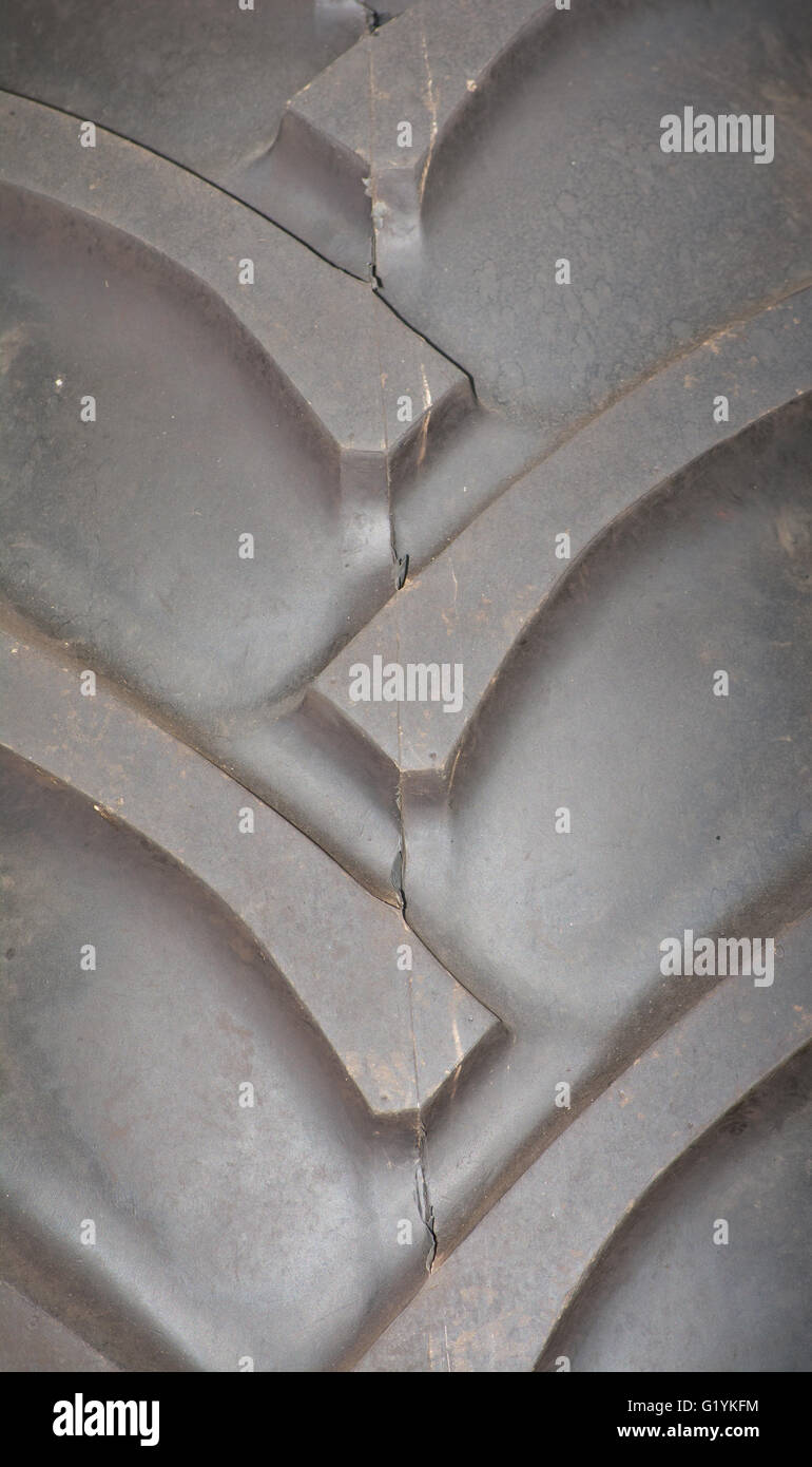 Closeup of treads on a large tractor tire Stock Photo