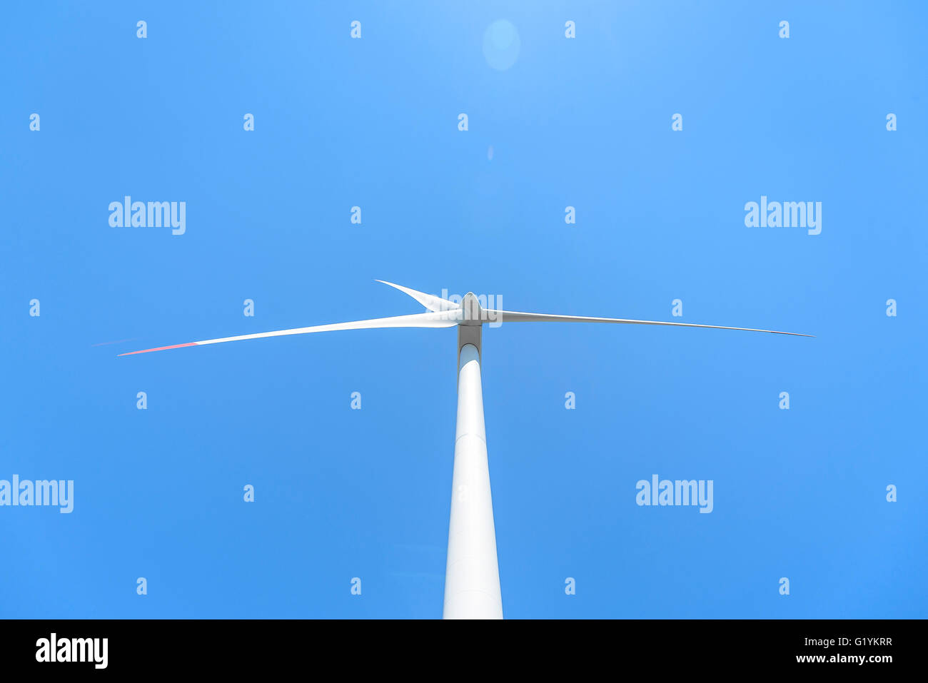 Power generation wind turbines against the blue sky with clouds Stock ...