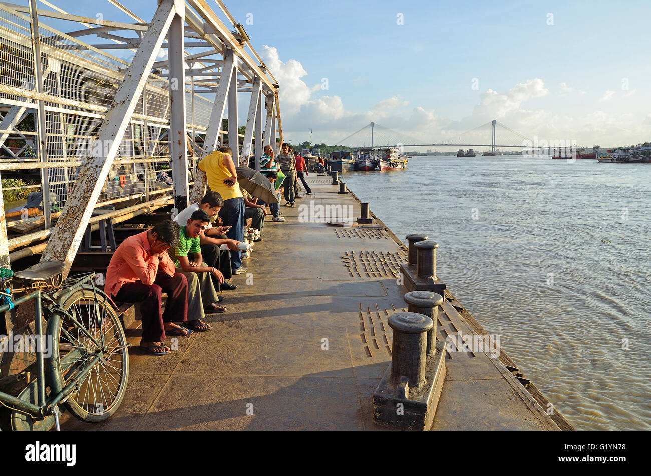 River jetty with Second Hooghly bridge at a distance, Kolkata, West