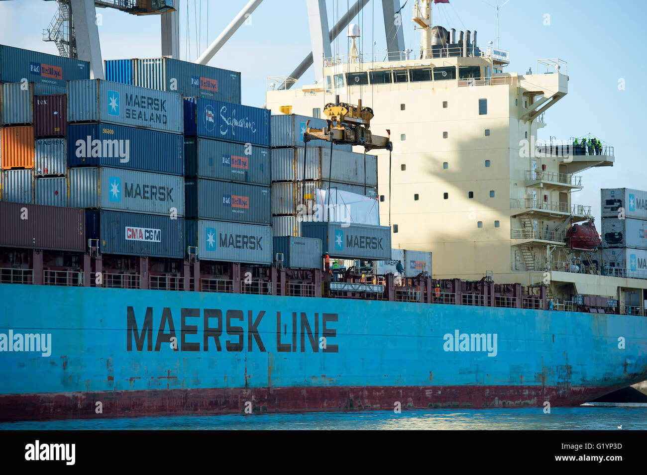 Containers are loaded on to the Maersk Container ship Maersk Jubail loading at Ports of Auckland container port. Auckland, New Z Stock Photo