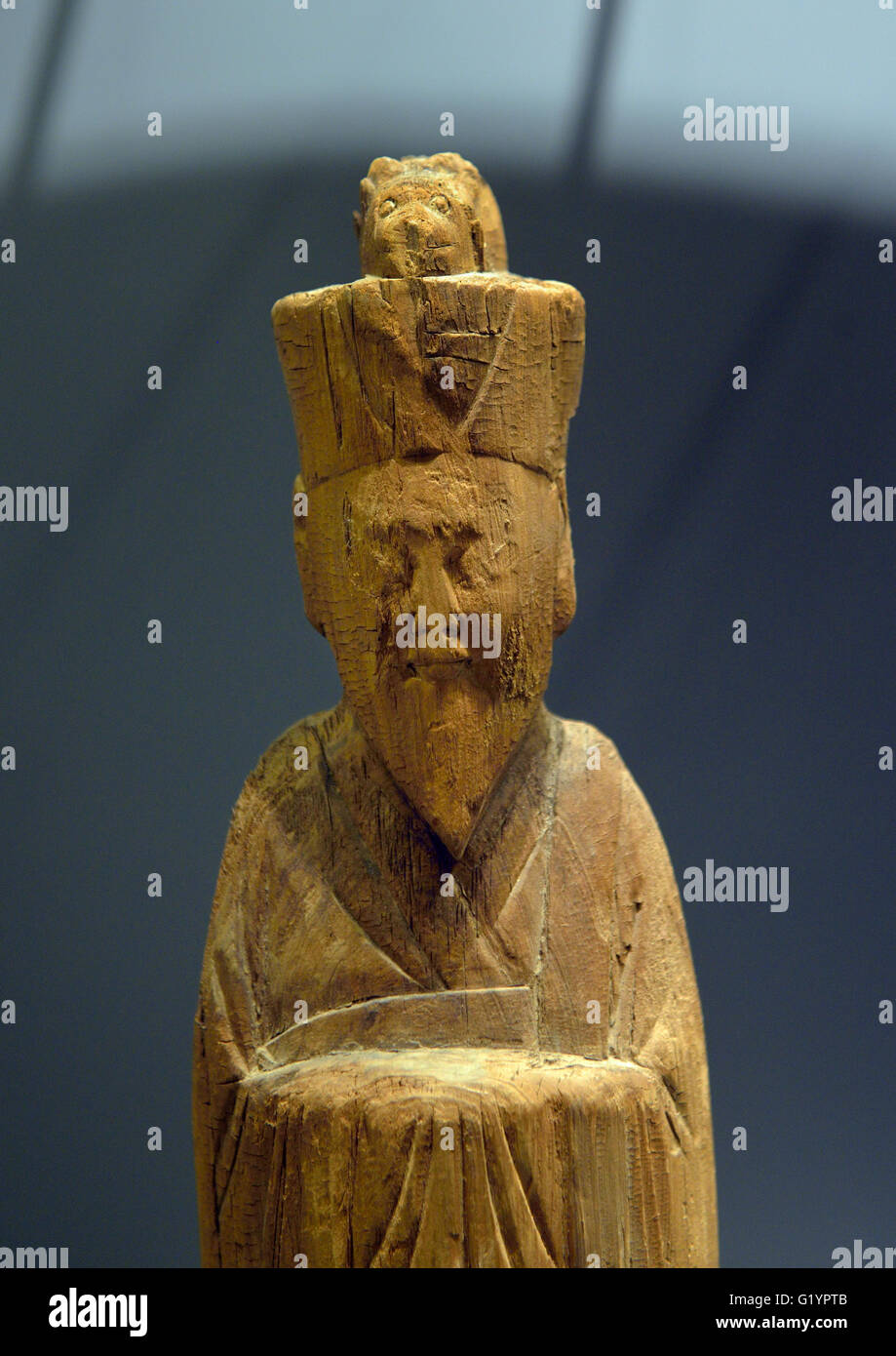 Wooden figurine of Chinese zodiac - a man under rat sign. Liao dynasty (916－1125) Capital Museum, Beijing, China. Stock Photo