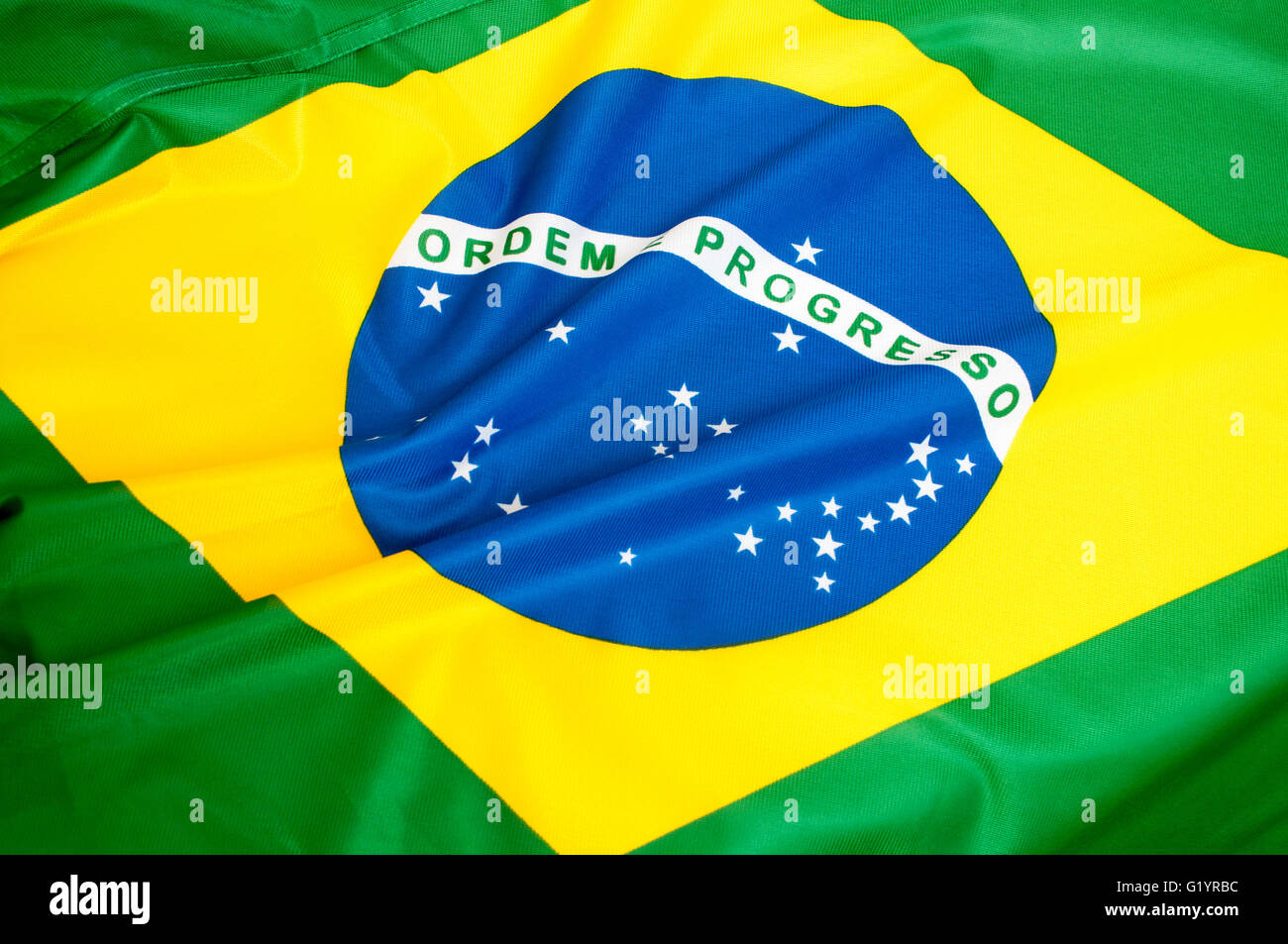 Background - Close up of the silky Brazilian flag Stock Photo
